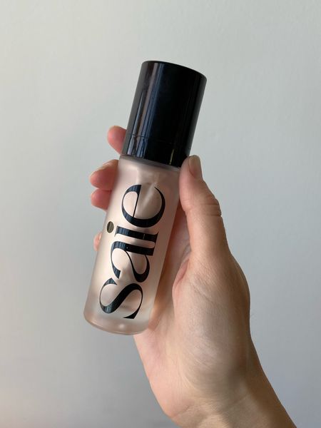 A holy grail product—I’m obsessed with this highlighter from Saie beauty. I apply first, underneath my foundation and it gives me the most subtle, healthy glow. 

#LTKunder50 #LTKbeauty #LTKsalealert