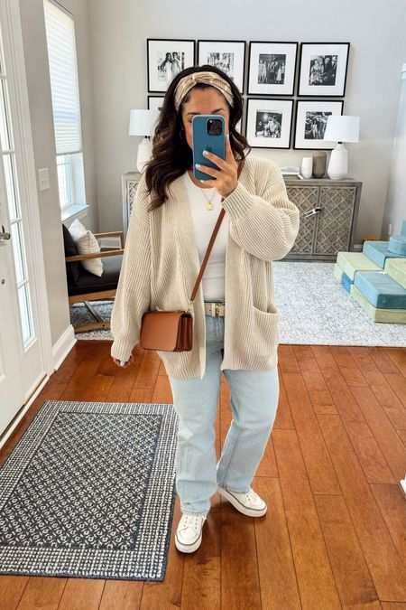 Product Featured: Quince Cotton Oversized Cardigan
What I Love: It’s perfectly oversized! Has the boyfriend fit without the frump. And it’s under $50!
Size Purchased: Small
My Stats: 5'1, 34DDD, Small, 4/27
Color Show : Speckled Beige
Color Options: Yes, 11 total! 
Size Options: XS-XL
Also Linked: My 90s fit jeans, favorite white tank top, everyday gold jewelry, cognac crossbody bag, and white sneakers.
Questions?! Drop them in the comments

Mom outfits, mom style, casual mom, spring outfit

#LTKSeasonal #LTKFindsUnder50 #LTKStyleTip