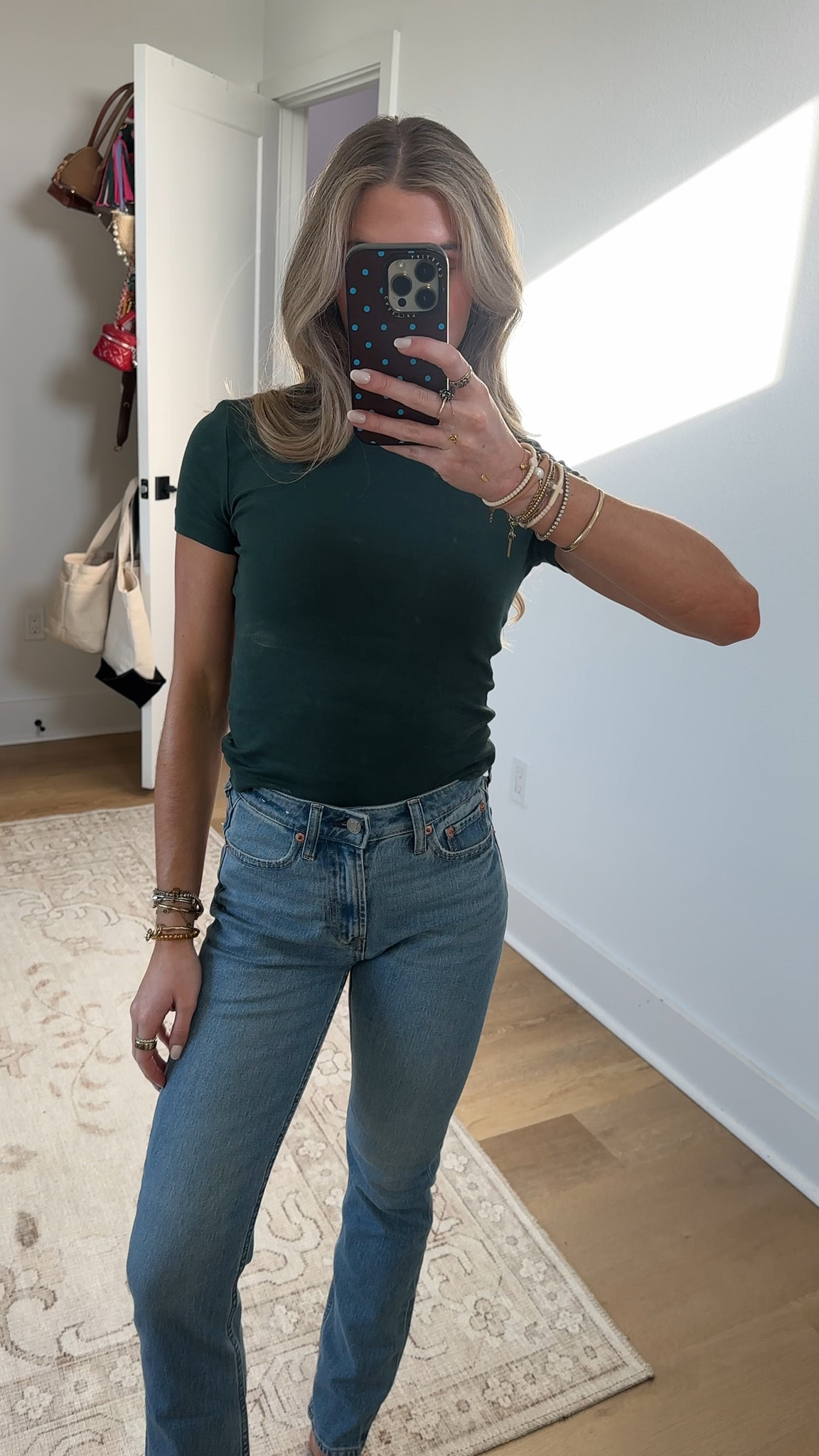 These jeans are from Gap size 24/00 curvy high rise 90s straight leg. A vintage-inspired fit that always feels current. Now in a curvy fit with extra room in the hip and thigh. Fit: A full-length classic straight-leg jean that's slim through the hip & thigh. Fabric: 83% Cotton, 11% Recycled Polyester, 5% Recycled Cotton, 1% Elastane. Stretch: Low Stretch Jeans. Looks like vintage denim but feels like you've had them forever. ​Easy & comfortable with a little secret stretch. Rise: High Rise Jeans. Look: A classic five-pocket jean in medium indigo wash. Details: Zip fly, five-pocket styling & holds-you-in front pockets.​
The Carolyn Basette Kennedy effect from the new Hulu show, Love Story  @gapstyle 

#LTKootd #LTKSaleAlert #LTKSeasonal