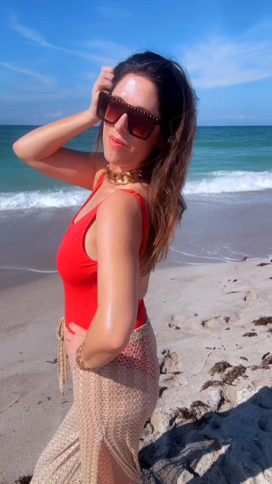 Red one-piece swimsuit from #bleurodbeattie and chunky gold jewelry by #stmoran #resortwear #miamibeach #swimwear #redswimsuit 

#LTKHoliday #LTKootd #LTKTravel