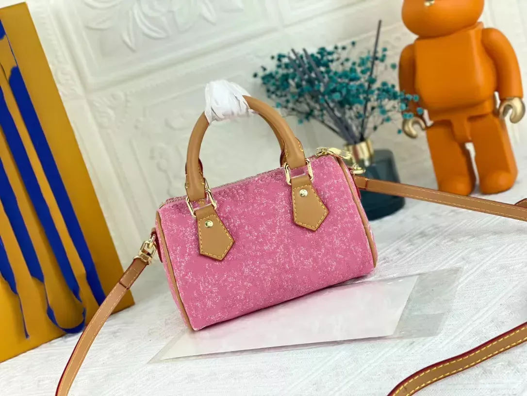 Shop Louis Vuitton Louis Vuitton Nano Speedy Mochi Pink handbag