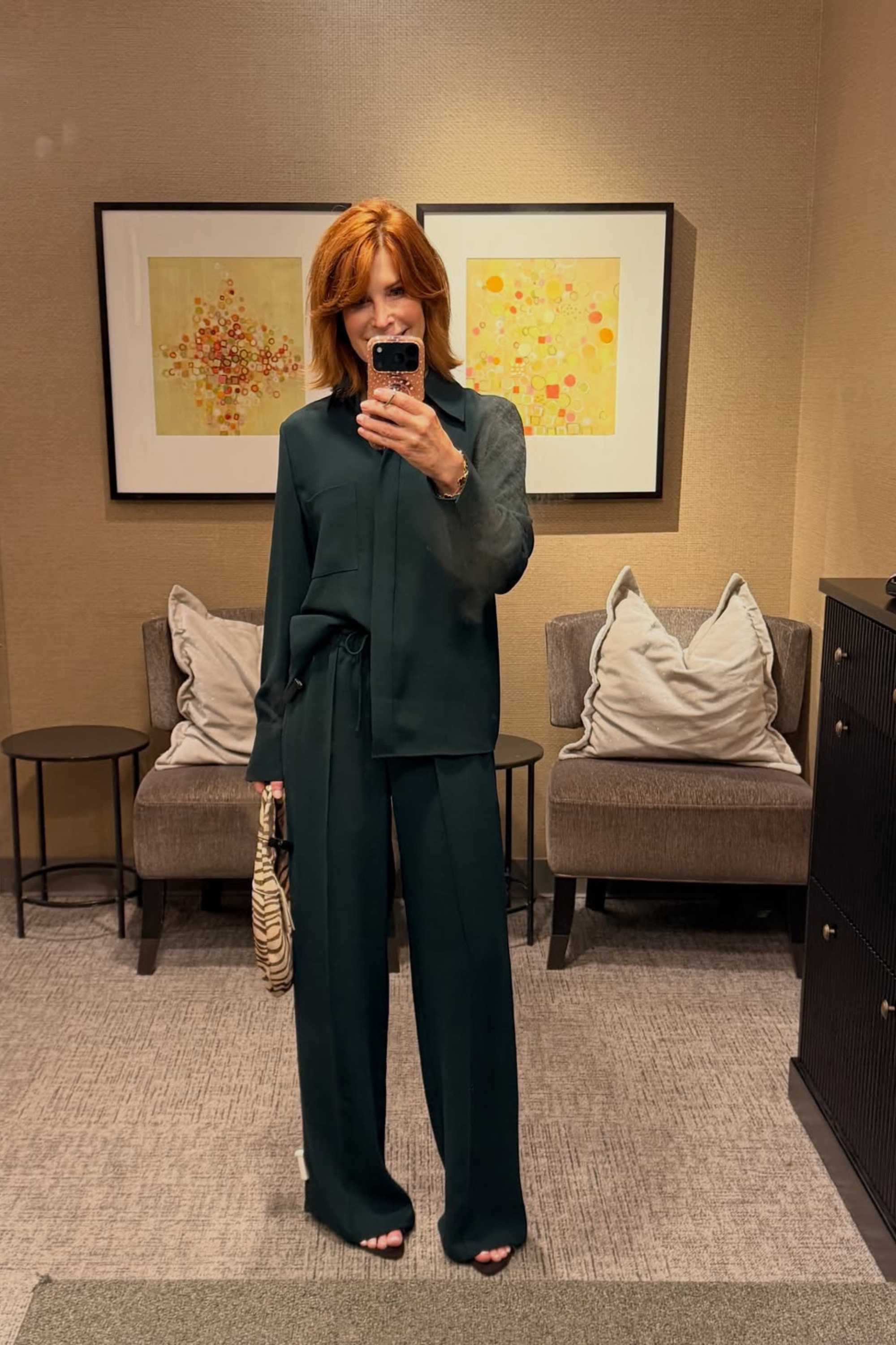 This rich green matching set makes business casual workwear feel effortlessly chic. The button-up shirt, wide-leg pants and zebra-print bag are all part of the Nordstrom Anniversary Sale and can be worn together or mixed with your existing wardrobe.

#LTKSeasonal#LTKOver40#LTKSaleAlert 

 