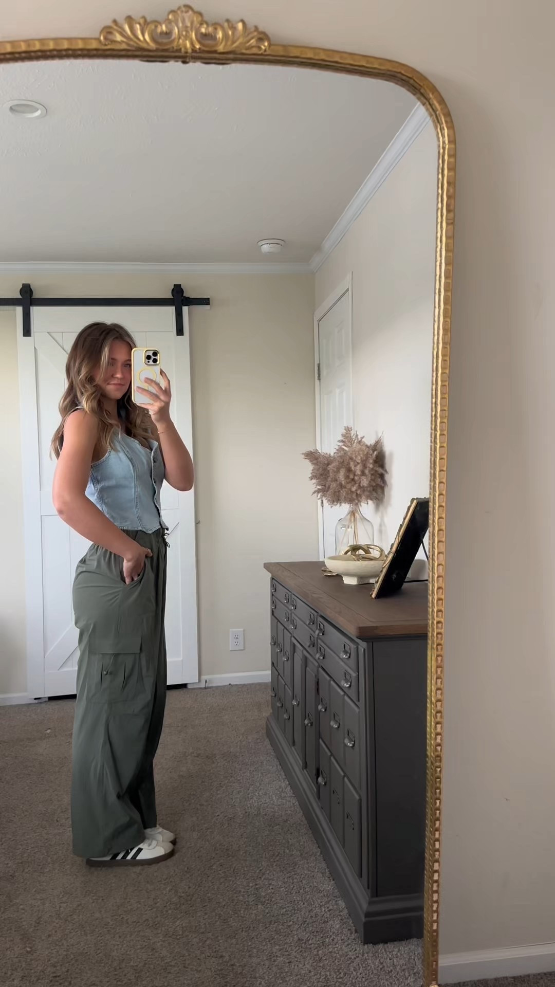 Everything is pretty tts. If in-between you can go down! 
Size medium in cargos, denim vest, and button front tank that I have in backwards lol. 
Size small in white tee & denim shirt (no need to size down though) 