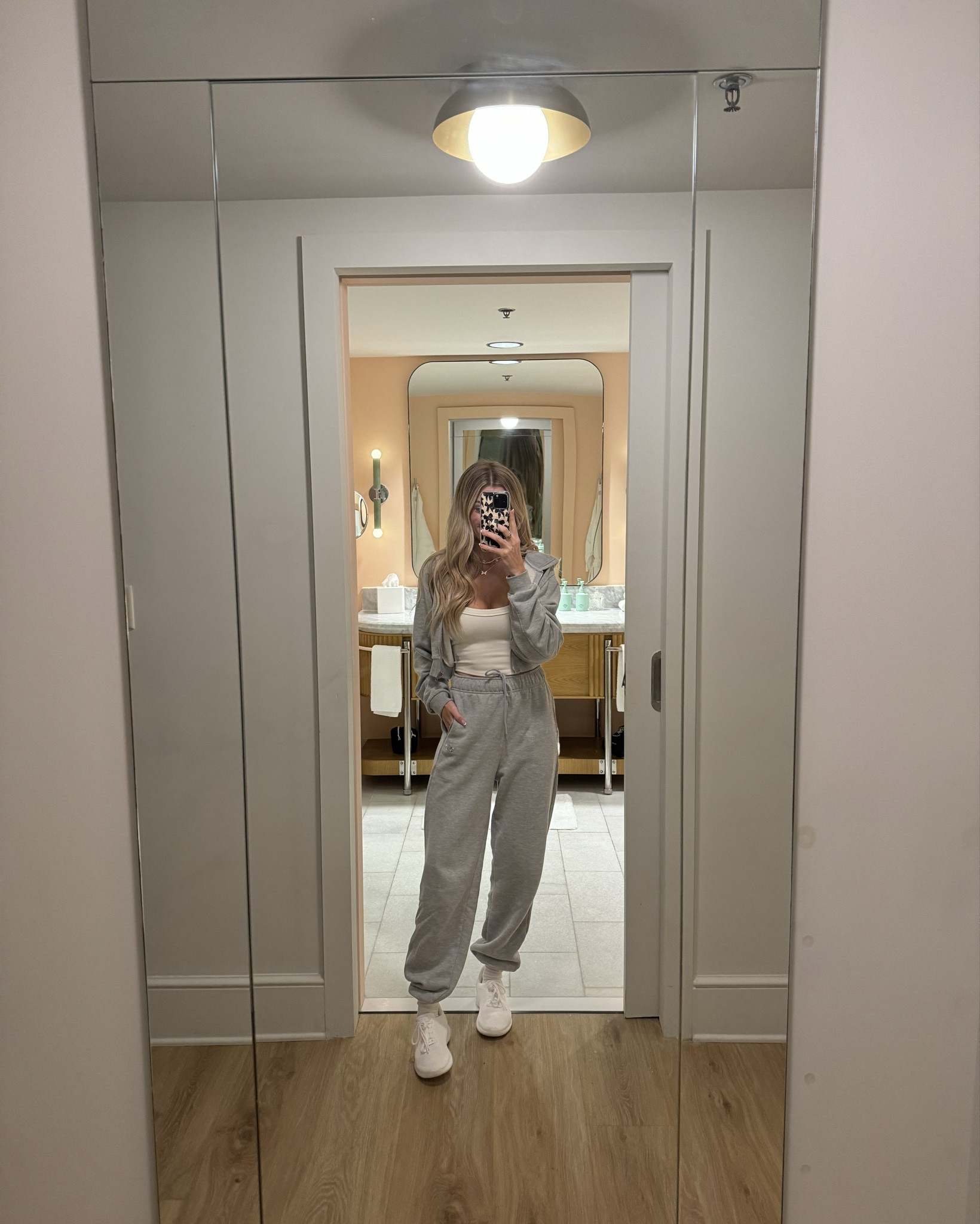 today’s travel outfit was so comfortable! this sweat set will be on repeat for the next few months. (wearing size small in the hoodie & size XXS in the sweatpants. pants run BIG - size down at least one size, if not two. I’m normally a size small, but sized down two full sizes in these and they’re still oversized!) 

travel outfit, sweatpants, sweat set, alo yoga, comfortable outfit 

#LTKSeasonal #LTKActive #LTKTravel