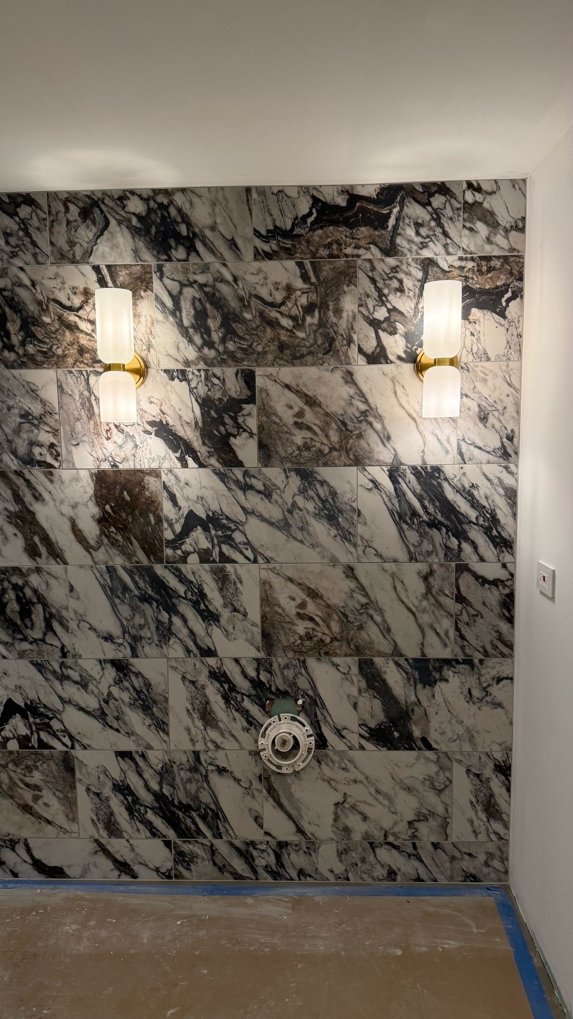 Bathroom reno so far, these sconces match Kohler modern brushed brass perfectly

#sconce #lighting #kohler #bathroom

#LTKHome