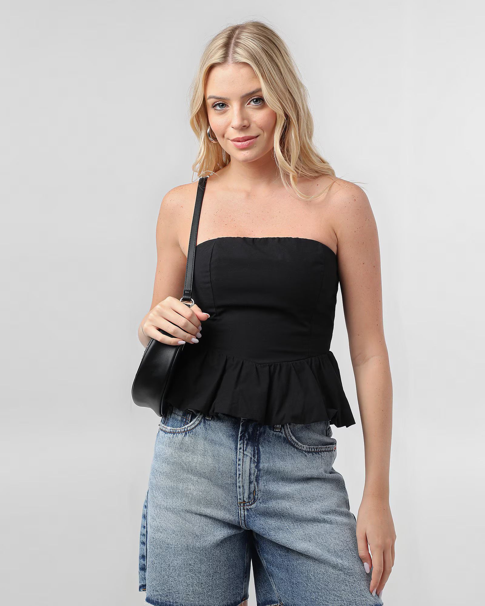 Top peplum com lastex preto | Pool | Riachuelo (BR)