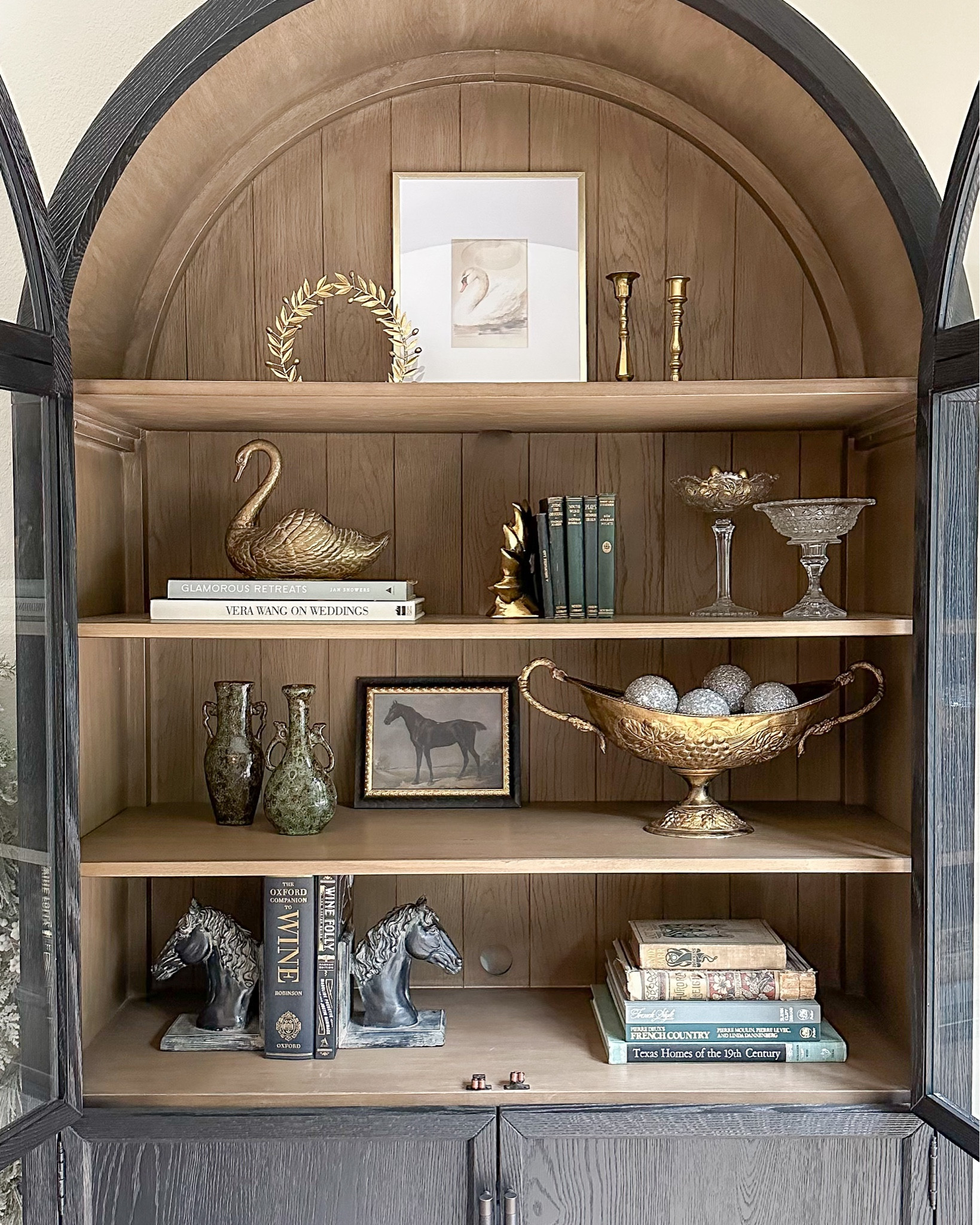 Holiday cabinet styling in my Arhaus Hattie arched cabinet! Most of this is vintage, but linked similar decor pieces I’ve found!

#LTKhome #LTKstyletip #LTKHoliday