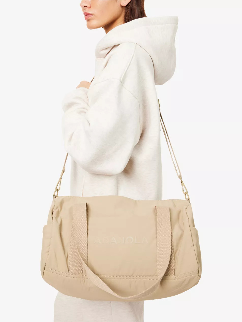 Logo-Print Nylon Duffle Bag | Selfridges