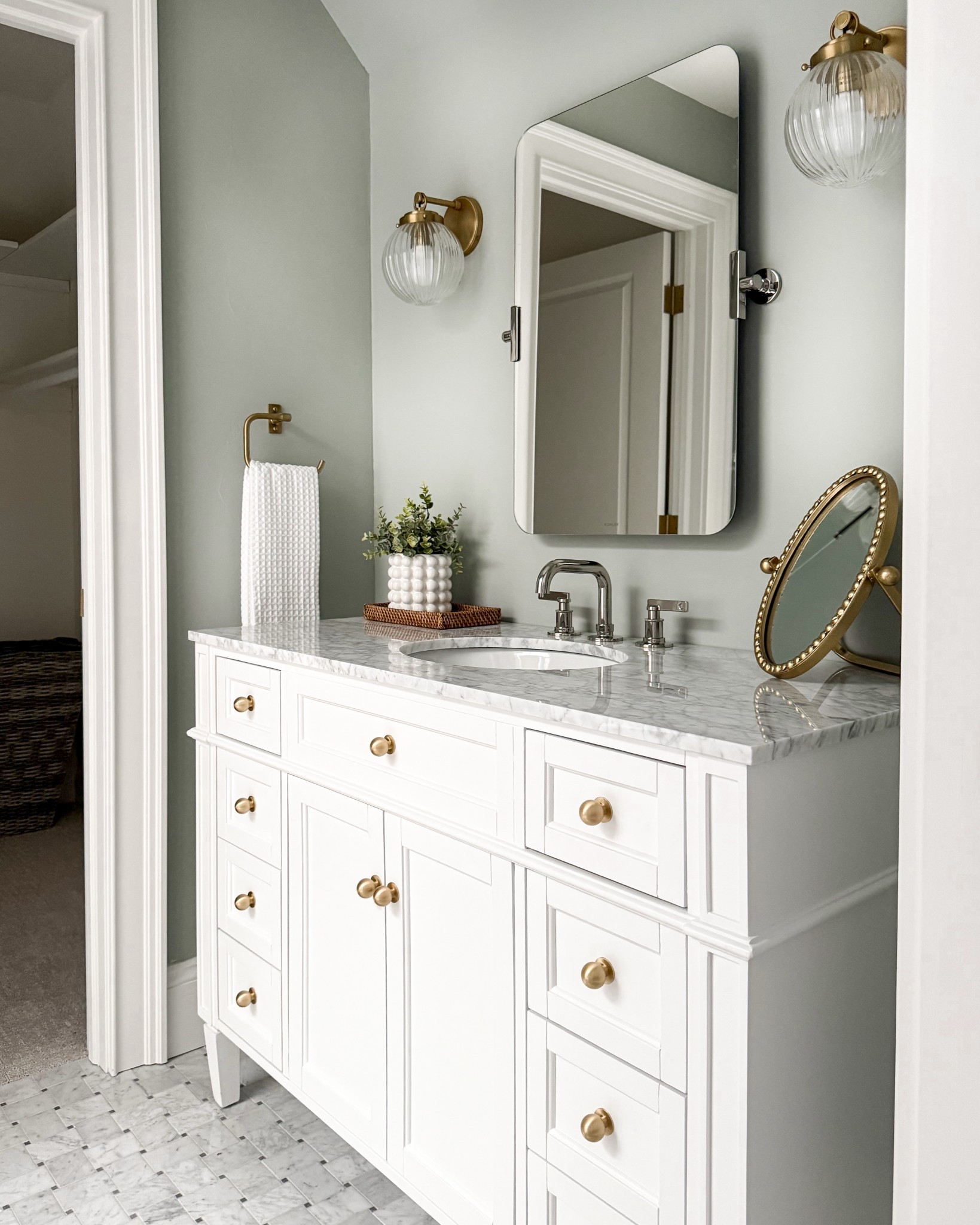 Shop this girls bathroom! Vanity, white vanity, makeup mirror, sconces, Kohler, mirror, geometry towels, Target bath, amazon finds, amazon bath

#LTKHome #LTKFindsUnder100 #LTKSaleAlert