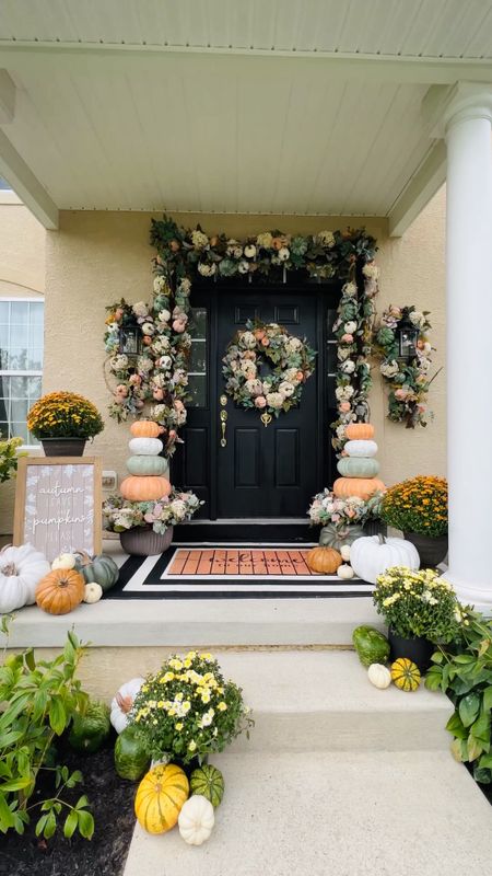Let’s decorate my front porch together for fall!! We surely do stand out on the block again!! 😭 Have some of my seasonal items sourced for you below! My exact garlands, wreaths and stacked pumpkins are from Balsam Hill! 🍂

Fall front porch
Outdoor terracotta planters  
Halloween decor
Halloween porch
Door mat
Planters 
Door rugs 
Outdoor rugs 
Faux pumpkins 
Fall wreath 
Fall garland 
Autumn decor 
Stacked pumpkins 
Fall sign 
Faux outdoor mums 

#LTKhome #LTKHoliday #LTKHalloween