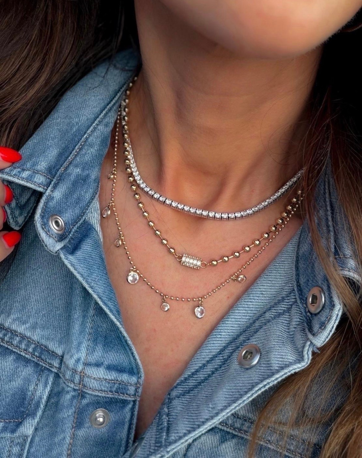 This layered necklace stack is the easiest way to make a denim jacket feel more styled. I love the mix of silver sparkle, warm gold, and delicate crystal drops because it looks collected over time instead of perfectly matched.

layered necklace stack, mixed metal jewelry, tennis necklace, gold chain necklace, crystal pendant necklace, statement jewelry, everyday jewelry, denim jacket accessories, necklace layering, elevated accessories, annabrstyle

#LTKootd #LTKOver40 #LTKgrwm
