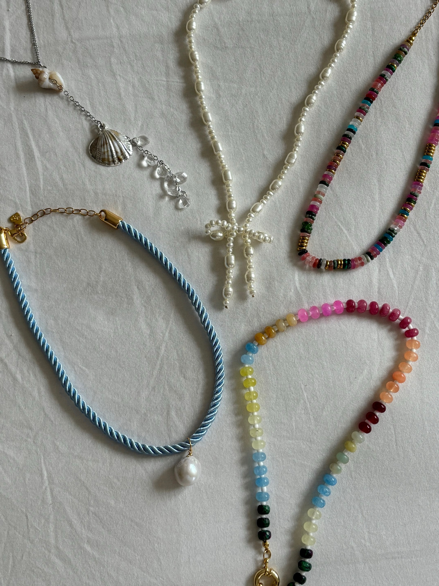 the blue one is the “Corsica Necklace in Baby Blue” frasier sterling 💕

#LTKFindsUnder100 #LTKSeasonal #LTKFindsUnder50