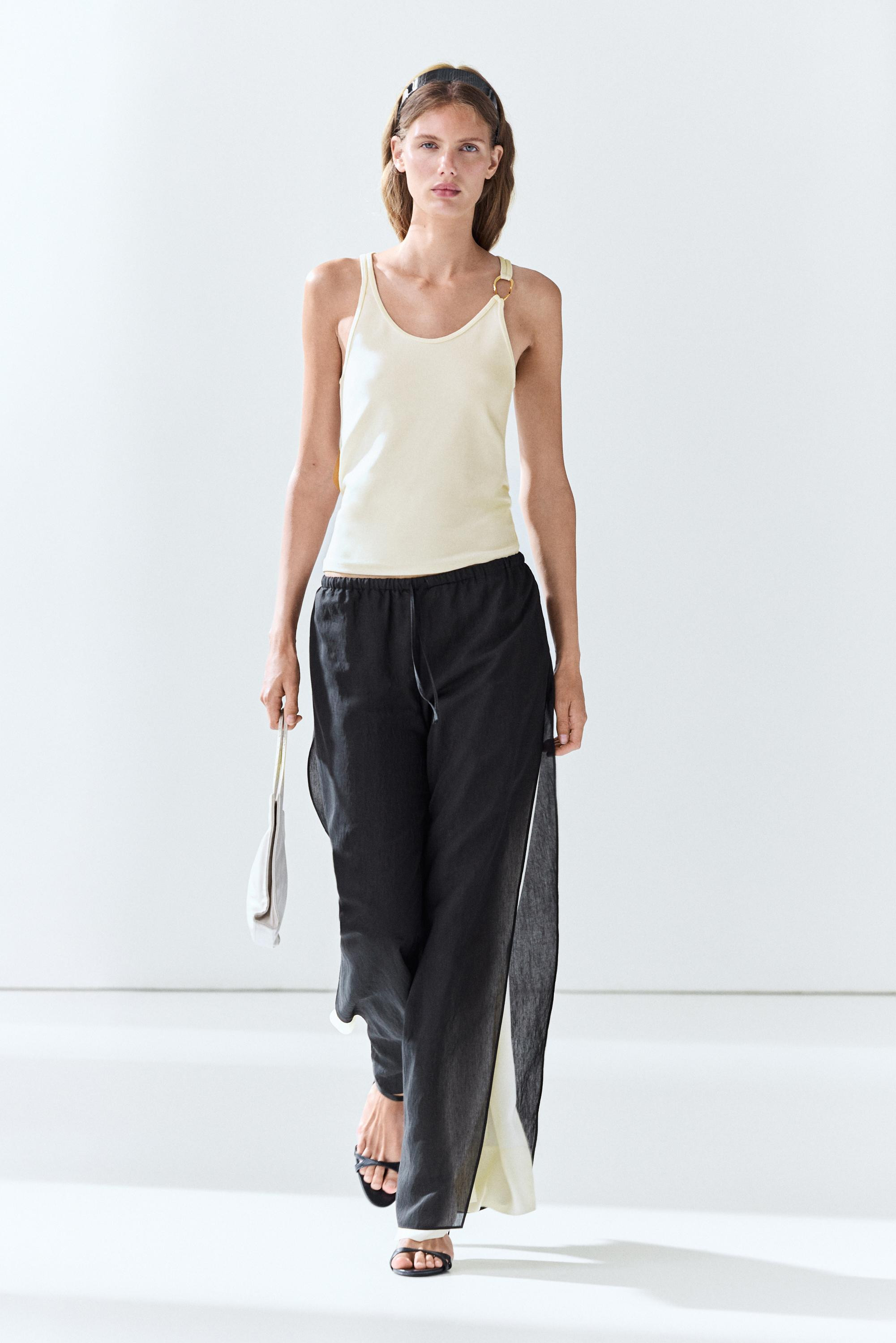 VIEW LOOK
Cotton blend jeweled detail top

 $70  Colour  Cream  Add to basket Colour Cream|Ref. 6... | Massimo Dutti US