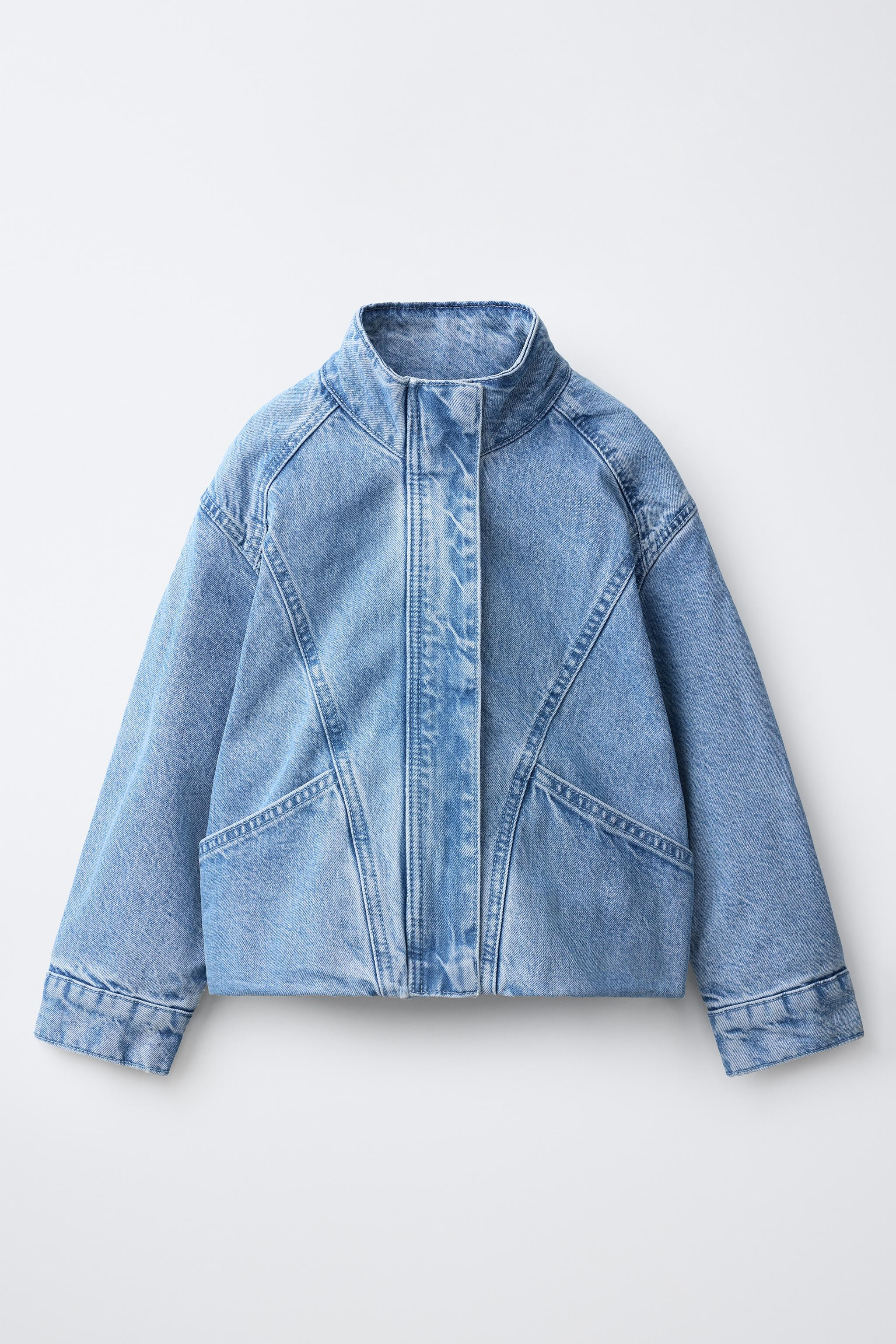 Denim jacket with a stand-up collar and long sleeves with button cuffs. Front zip closure conceal... | Zara US