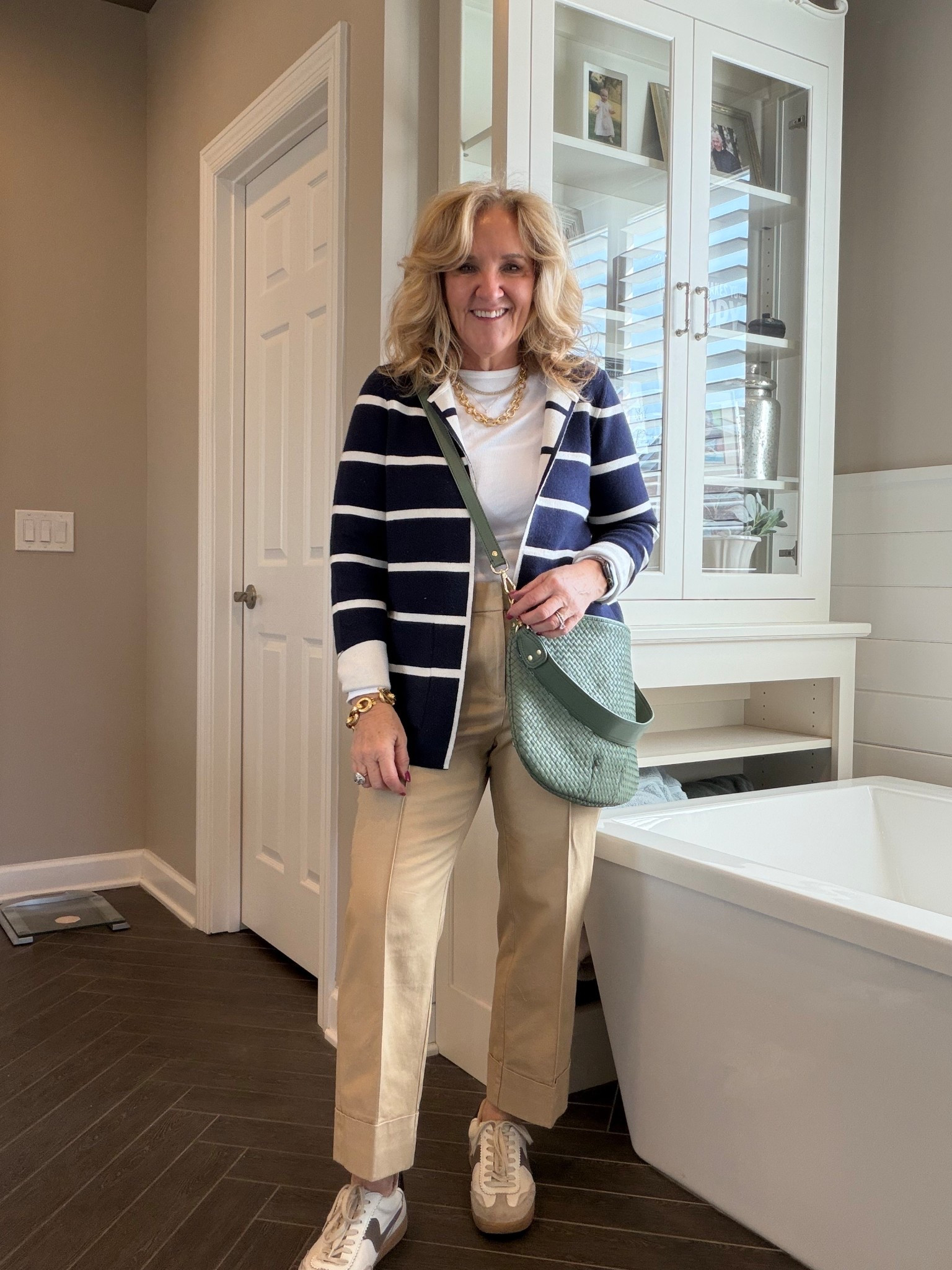 It’s reversible. Isn’t this a cute sweater? Wearing size 1.0
Khakis size 8 petite white tee size medium 

#LTKOver40 #LTKWorkwear #LTKTravel