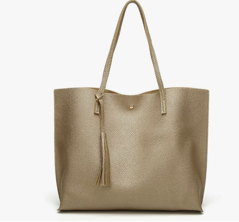Used this on our Mexico vacation as my pool/beach bag and it was perfect. It’s on the smaller side (exactly what I was looking for!) but still big enough for sunscreen, phones, hats, and a swimsuit coverup. I’ve found most beach bags are way bigger than I actually need — this one is just right.

So versatile and can easily be used beyond the beach! I have the silver which works great for summer and winter. Gold is perfect for spring and fall, and there are tons of other colors to choose from. I removed the tassel on mine for a more minimal look. 

 #LTKvlog #LTKSwim #LTKTravel