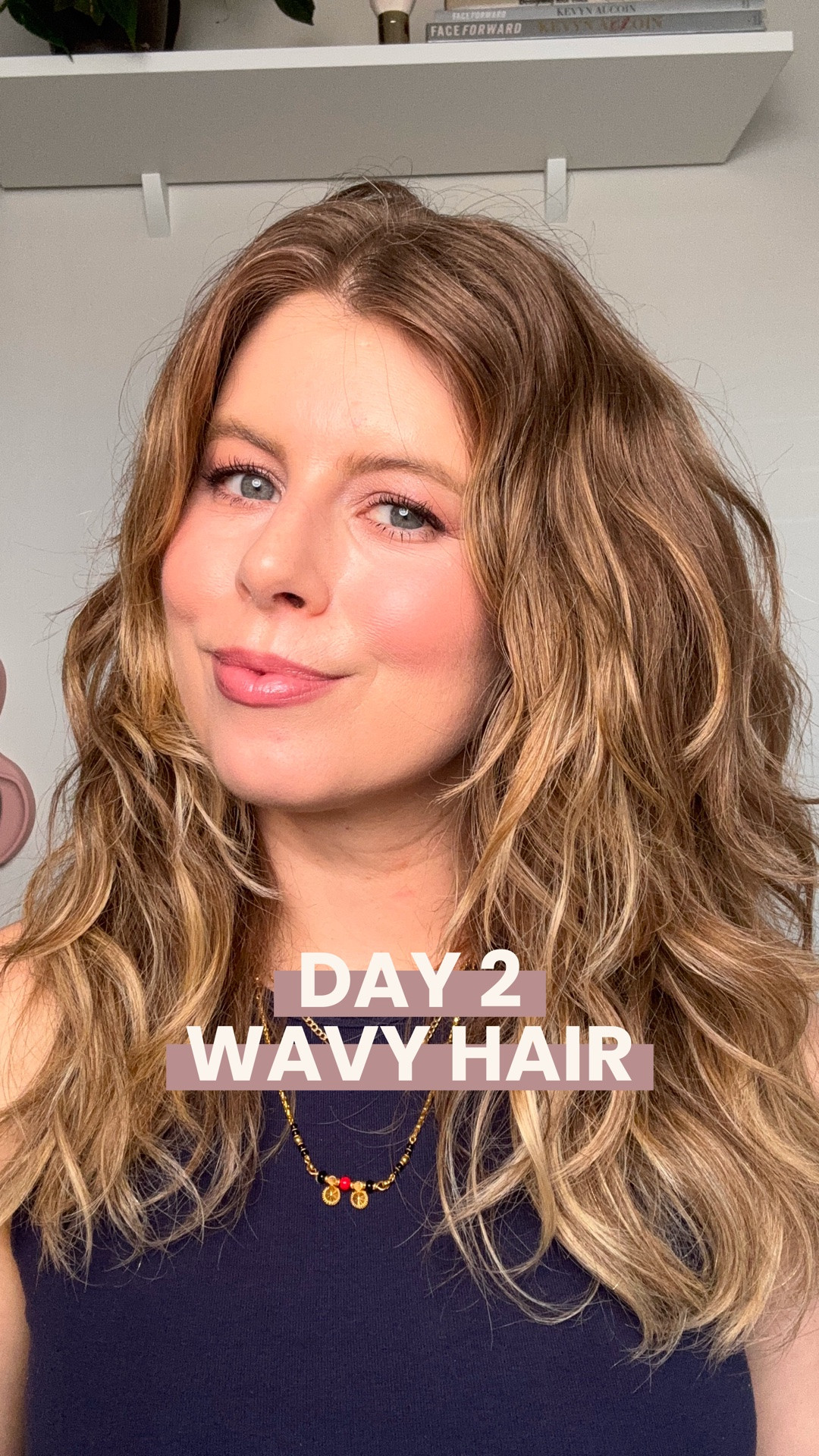 This is how I bring more definition and shine back to my day 2 wavy hair!

Products used in video:
R&Co Velvet Curtain Texture Balm
Gisou Honey Infused Hair Oil