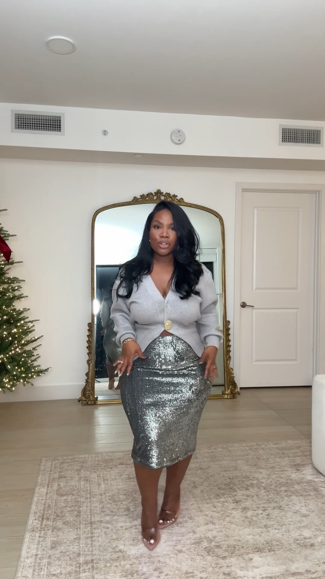 Another fun holiday number. Love the wide shoulder and ornate gold detailing on this sweater and really love the way this sequin midi skirt is done. Has good stretch, very generous in size, and perfect for my curvy girls.

Sizing Details:
Sweater: Small
Sequin Skirt: Medium

Holiday outfit, sequin outfit, curvy outfit, winter outfits, midsize style, petite style 

#LTKMidsize #LTKootd #LTKHoliday