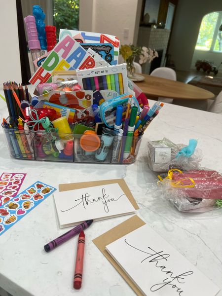 Working on thank you cards with my 3 year old for his teachers for Teacher Appreciation Week! 

Grabbed our arts and craft bin with our favorite stickers, paper, and crayons.

For the actual gifts, I picked out some favorites from Sephora including eye masks, lipglosses, bronzer palettes, and moisturizer & serums. 

It’s an easy grab and go and perfect for any arts and craft station. 

#LTKhome #LTKkids #LTKfamily