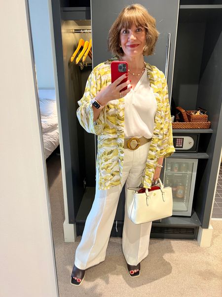 Leopard print yellow kimono jacket,  white v-neck top, white linen trousers, brown open toe sandals, white handbag, brown stretch belt, pearl and gold necklace 

#LTKstyletip #LTKeurope #LTKSeasonal