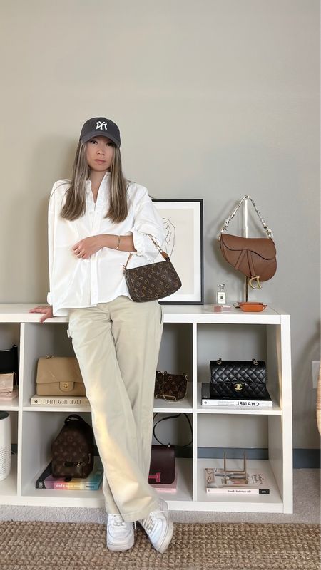 Utilitywear inspired modest and minimalist outfit 🤍 outfit details: white oversized button-up shirt from djerf avenue, beige carpenter pants from aritzia, white sneakers from nike, bag from louis vuitton // outfit inspo, streetwear style, street style, utilitywear fashion, minimalist style, modest fashion, winter outfit, get ready with me, 90s style

#LTKunder100 #LTKunder50 #LTKstyletip