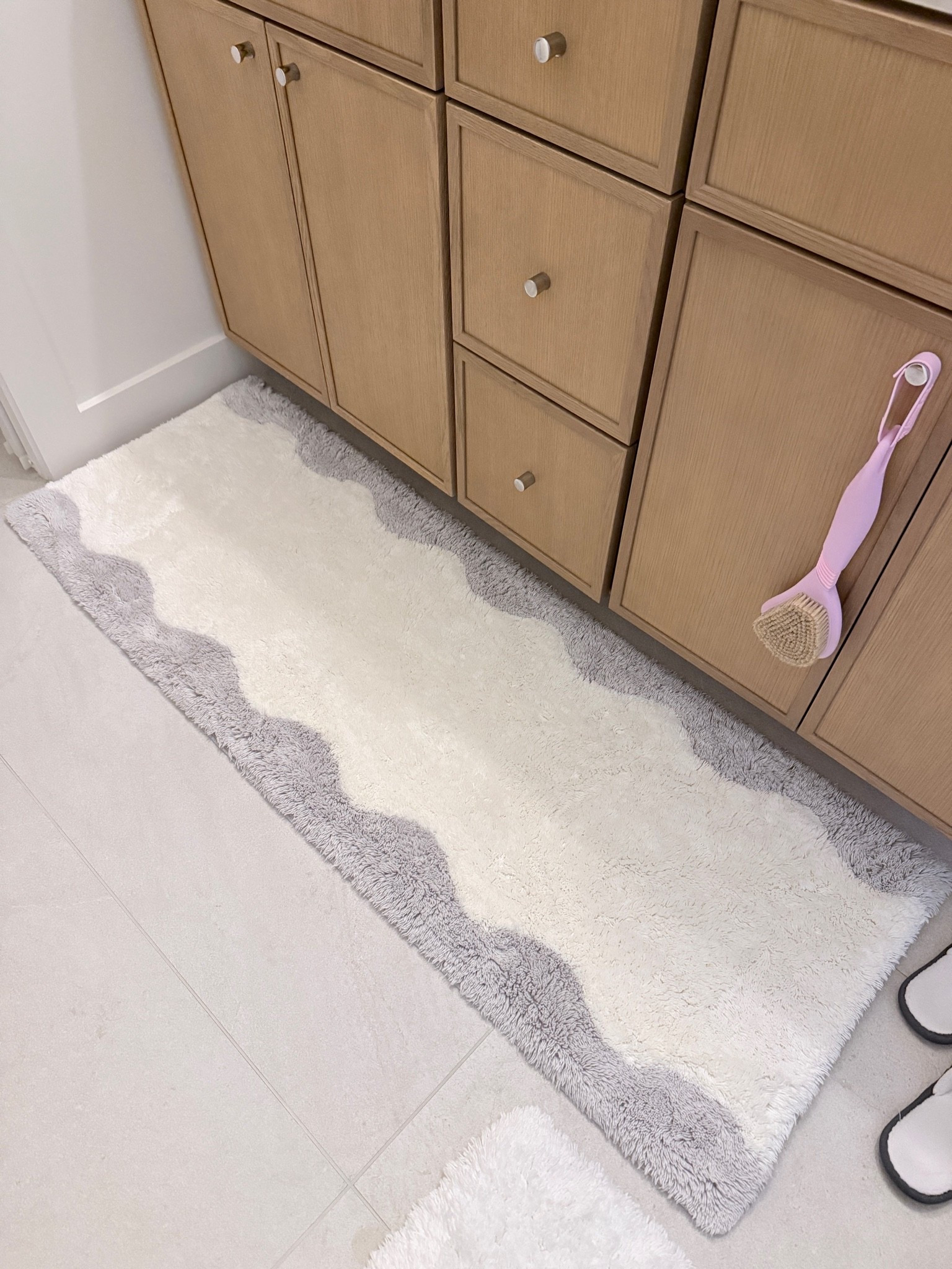 I have this in my bathroom and I also have the standing mat for my kitchen and I absolutely love it. Where do you spend most of your time in the kitchen in the bathroom? It’s cushion this one washes super well so it’s worth the investment ￼￼

#LTKmorningroutine #LTKOver40 #LTKHome