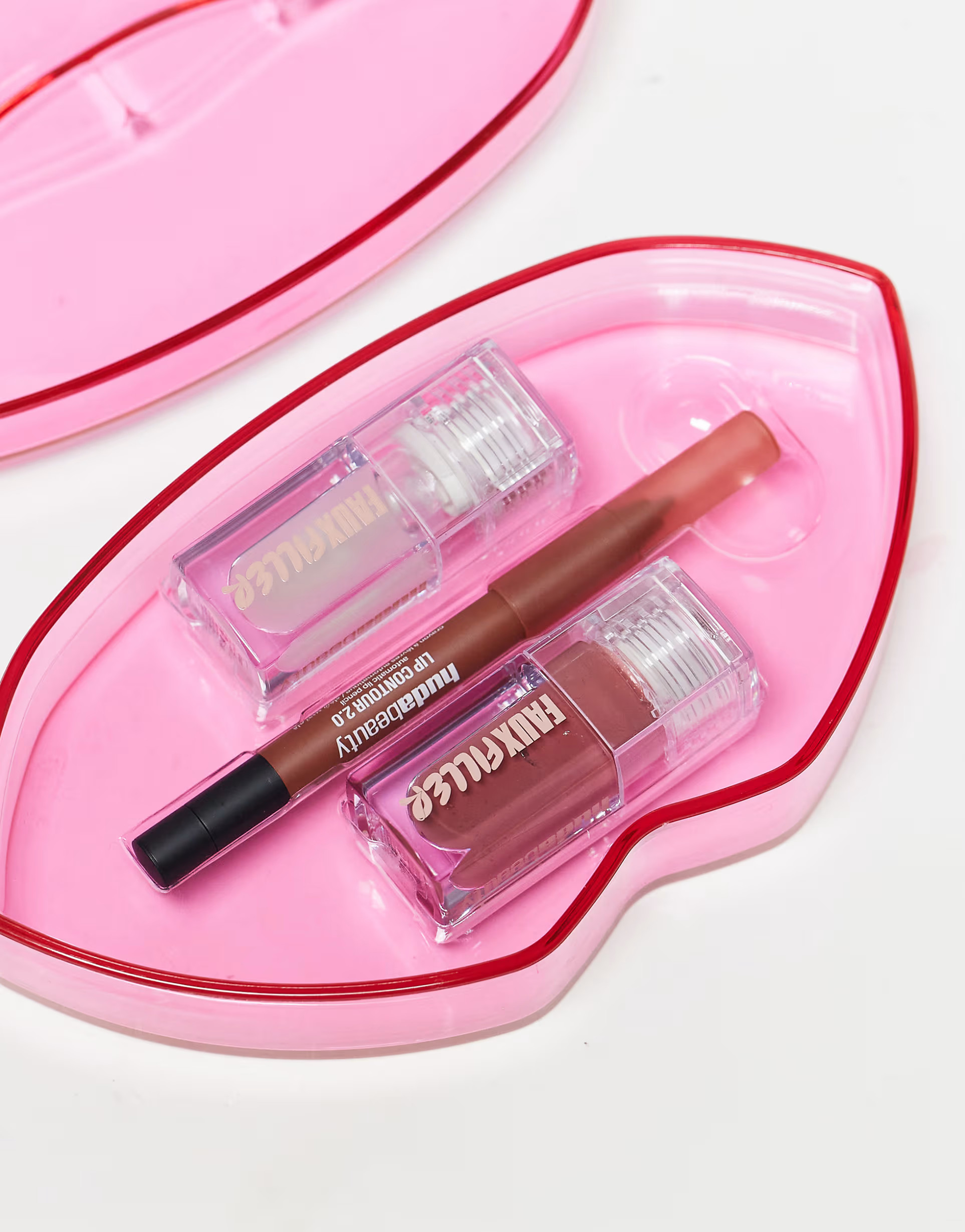 Huda Beauty Lip Trio- Faux Filler Gloss Bombshell + Faux Filler Gloss Glassy + Lip Contour Warm B... | ASOS (Global)