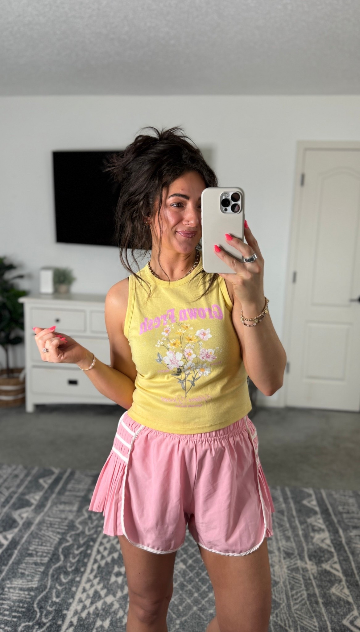 Cutest $6 tank! If between sizes you could go up (I’m in the medium) FP inspired shorts are Amazon and come in a bunch of colors. In my true size small 

#LTKActive #LTKSeasonal #LTKootd