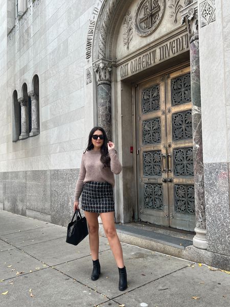 Tweed mini skirt; brown sweater (from Zara); black sunglasses; black ankle boots; black tote purse; neutral fall outfit; neutral outfit 

#LTKstyletip #LTKunder100 #LTKSeasonal