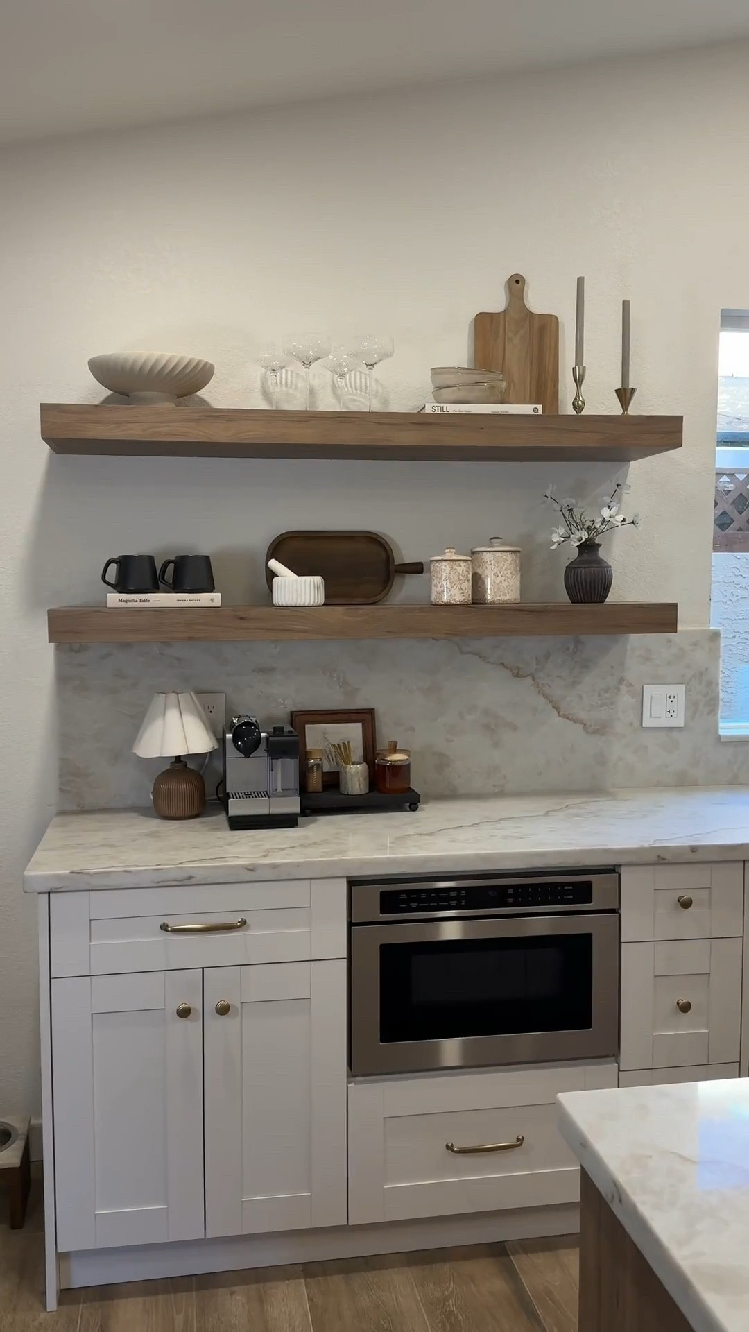 Everything I used to decorate my kitchen shelves! Mix and matching items of different materials is the key to a perfectly styled shelf. 

I used: 
• books 
• serving boards
• pedestal bowl 
• coupe glasses 
• candle holders 
• coffee mugs 
• stacked bowls 
• pestle and mortar 
• canisters 
• mini vase 

Kitchen styling, kitchen accessories, kitchen styling, decorating my kitchen, kitchen shelves, kitchen shelf, floating shelves, coffee bar, neutral home, kitchen style, kitchen decor 



#LTKSaleAlert #LTKHome
