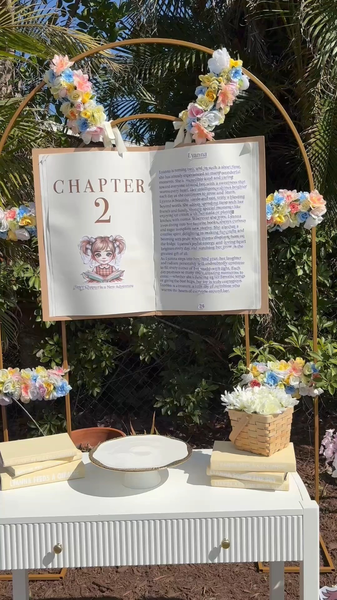 Every chapter is a new adventure ✨📖 For our daughter’s 2nd birthday, I made this giant open book as part of her ‘Chapter 2’ theme! I used 2 foam boards from Dollar Tree for the cover and 6 poster boards for the pages, attaching them together to create an open-book effect. The ‘pages’ tell a little story about these past two amazing years, with a special sketch of her reading The page number 24—because she’s 24 months of pure joy! 🥹 I hung it on an arch with ribbon to create the perfect backdrop behind her cake table. ✂️✨ Watch the full process to see how I made it!

#LTKParties #LTKBaby #LTKKids