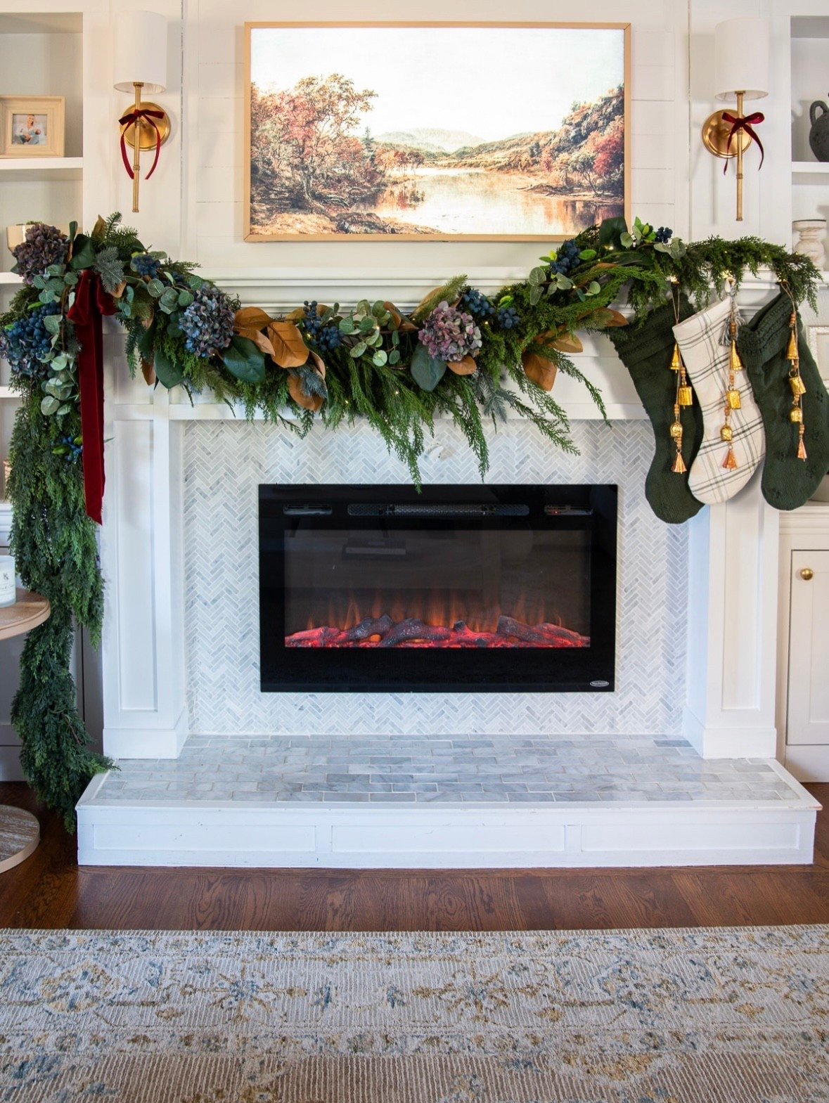 I went for a different look with my living room mantel this year and I love how it turned out! I used a mix of cedar, magnolia, and dried hydrangeas.

#LTKHoliday #LTKFindsUnder100 #LTKSeasonal