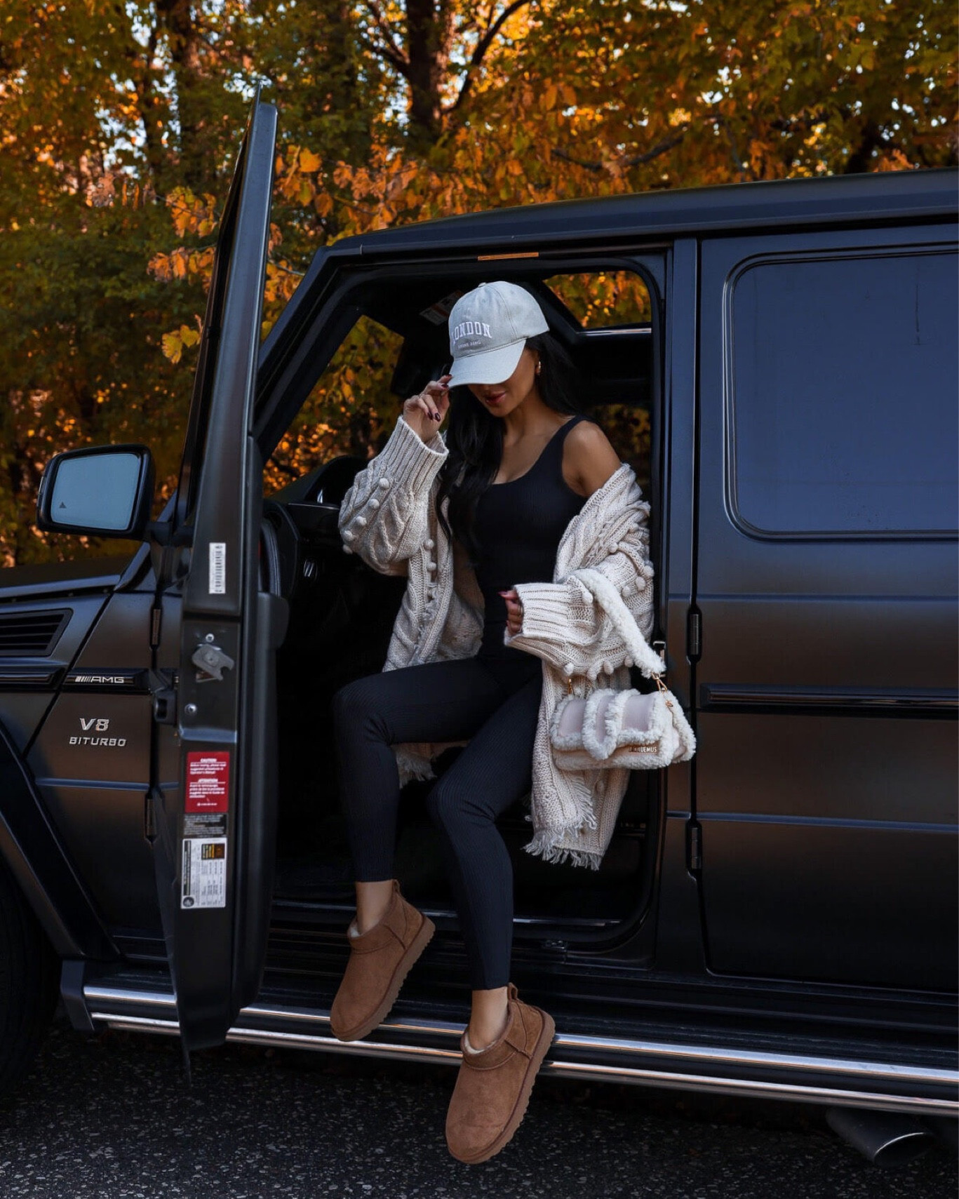 Casual fall outfit ideas / weekend ourfit
Saks black catsuit / romper wearing an XS
Ugh ultra minis run TTS
Anine Bing baseball cap
Jacquemus shearling bag 


#LTKshoecrush #LTKSeasonal #LTKsalealert