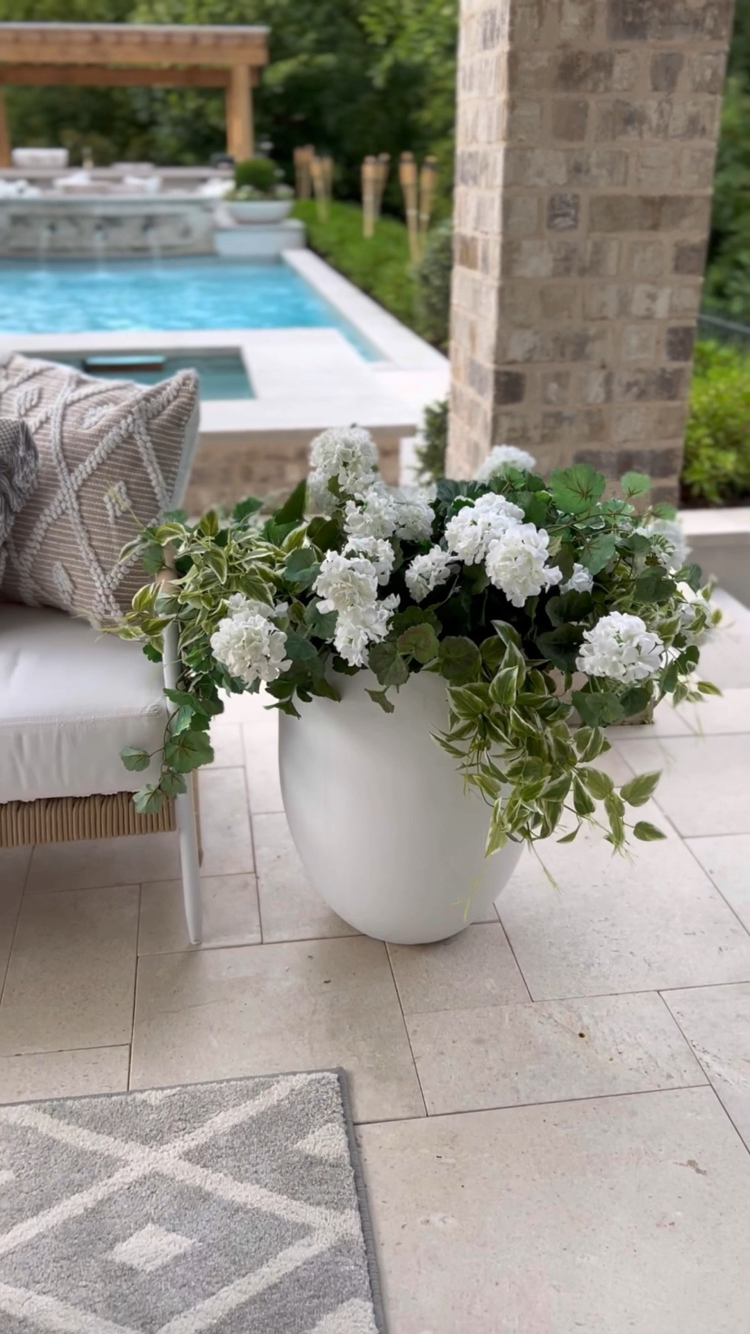 Is it too hot to keep up real flowers where you live? It sure is here in Texas! 🥵☀️🔥 Plus I’m terrible at remembering to water my potted plants. 🙈 So here’s how I create my large outdoor planter arrangements with maintenance-free faux flowers and plants!

1) Use another smaller pot (like i did) or use other filler to take up space inside the pot. 
2) I then added this planter insert (available at Walmart, Lowe’s, or Home Depot) to create a level surface.
3) Add plant foam bricks (I got mine at Michael’s) across the flat surface.
4) Place faux plants into the foam to secure them in place. 
5) I used 4 floral bushes and 4-6 greenery bushes in each large planter.
5) That’s it! I usually just gently hose off my faux plants each season to clean dirt and dust.



#LTKSeasonal #LTKhome #LTKFind