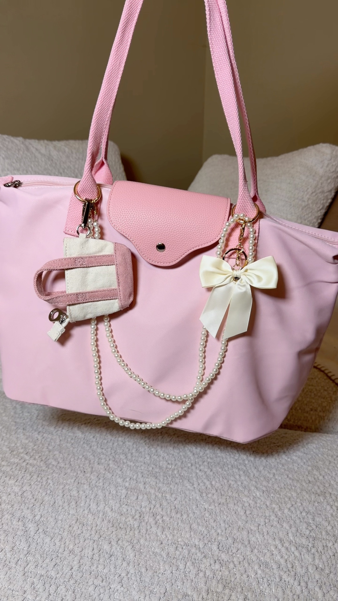 Pack this adorable pink tote with me!
One of my favorite new purse accessories is the crumb catcher bag! Other sticky ball inside the case collects crumbs and you can take it out to rinse and reuse! As a mom who’s always storing my kids stuff especially snacks, this is game changer!
As is this mini hairbrush. My girls’ hair gets crazy so I always need it with me.
This purse light has become useful for bigger bags and makes the perfect stocking stuffer
The hand warmers are adorable and also my favorite stocking stuffer 

#LTKItBag #LTKHoliday #LTKGiftGuide