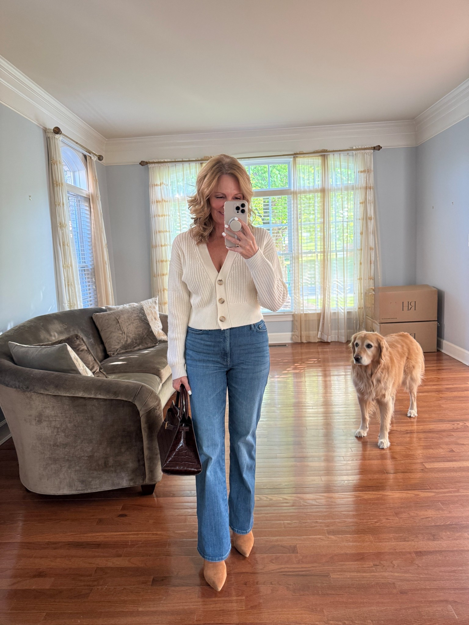 Cropped sweaters on a petite figure...and high waisted jeans create the look of longer legs