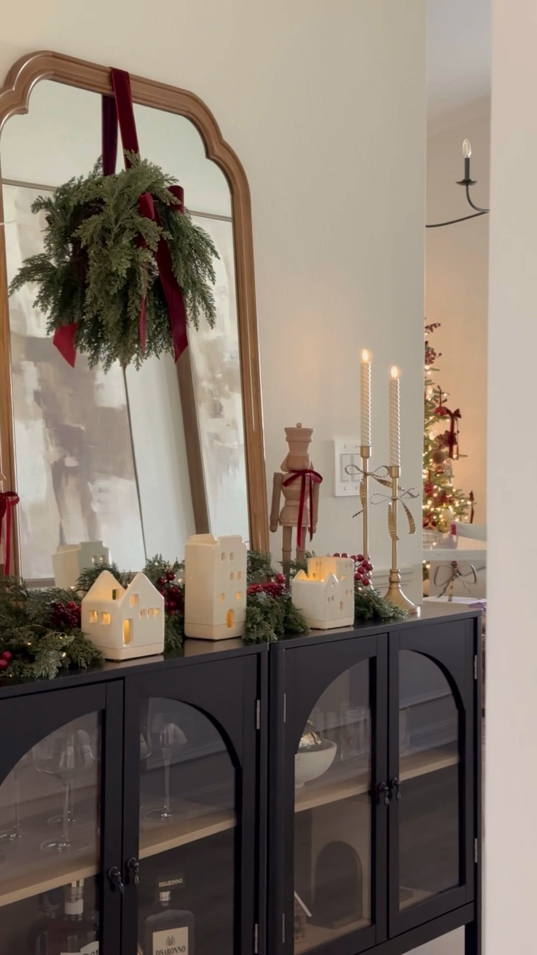 One of my favorite Christmas traditions: bringing out our little ceramic village and giving it a new moment to shine. 🎅🏽

I added a new garland and wreath from @kirkland’s this year and some deep red velvet bows to keep it cohesive with the rest of my decor.

Comment shop and I’ll message you the links! ❤️

#LTKHoliday #LTKHome