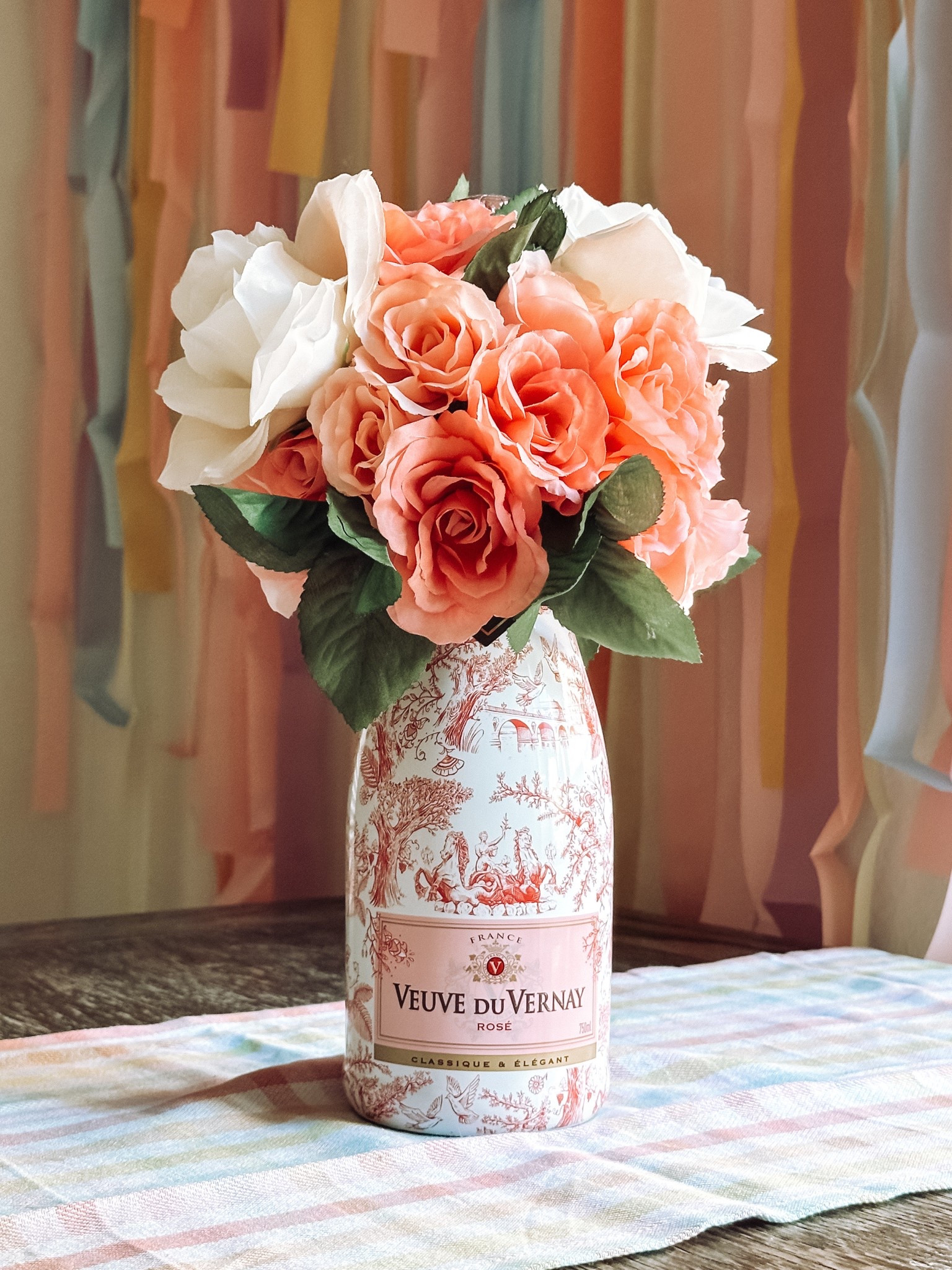 It’s so easy to make this fun gift! Perfect for any occasion! Linking everything you need! You just make a hole in the styrofoam and place it over the top of the bottle and add in your faux florals! 🌸

#LTKParties #LTKHome