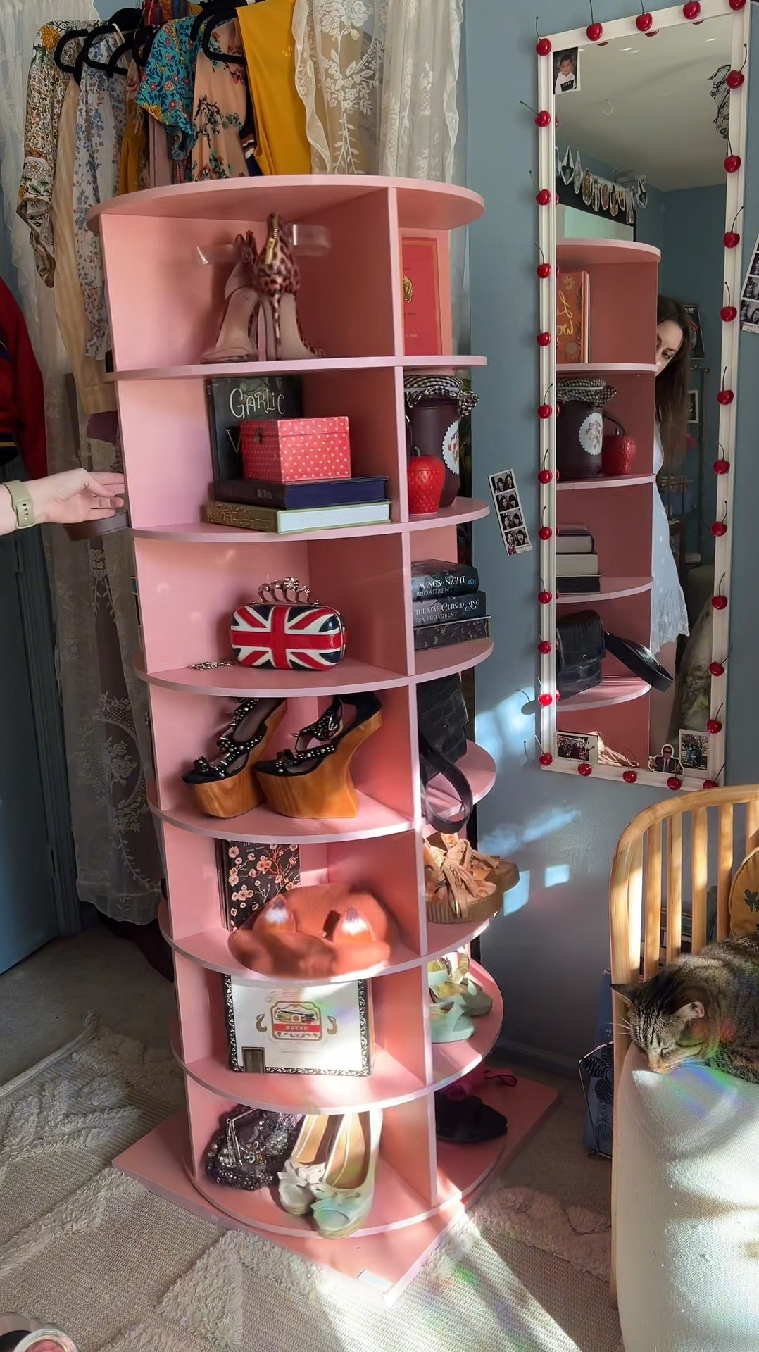 I’m in my rotating storage era. Check out this pink rotating shoe shelf I was gifted for an honest review! I’m so grateful they took a chance on a NANO creator. 🌸🥿 It's the sturdiest I could find online with a wooden build and secure screws. The compartments are spacious, holding up to 28 pairs of shoes, or 56 pairs if you use shoe boxes. You can also fit multiple shoes in the compartments even without boxes. Plus, there's extra storage on top. Perfect for books, makeup, shoes, and purses. You can probably fit at least 200 books on it! Most standard hardbacks fit horizontally, while some paperbacks and smaller hardbacks fit vertically. I can also see a beauty guru storing all their favorite skincare, makeup, and perfume products here to display them and prevent them from expiring in drawers. The shelf is very versatile and spins smoothly. The setup was easy, but I included some tips in my video. Available in pink, white, blue, and gray. Great vertical storage for small spaces—I love it! 💕 #Review #ShoeShelf #SmallSpaceSolutions #amazonfinds #storageideas #shoedisplay #pursedisplay #rotatingstorage

#LTKShoeCrush #LTKHome #LTKBeauty