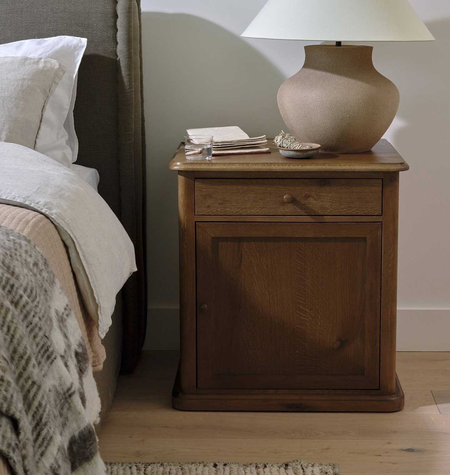 A classic nightstand that instantly elevates a bedroom 🤍 The Poppy Nightstand by Amber Interiors has the prettiest warm wood tone, timeless lines, and that effortless collected look I’m always drawn to. One drawer + cabinet storage makes it just as functional as it is beautiful

Amber Interiors, Poppy nightstand, wood nightstand, cozy bedroom, neutral bedroom, warm wood furniture, timeless bedroom, high end furniture, organic modern, classic bedroom furniture, luxury nightstand, designer bedroom, collected home, investment furniture, bedroom styling, California casual, earthy interiors

#LTKHome