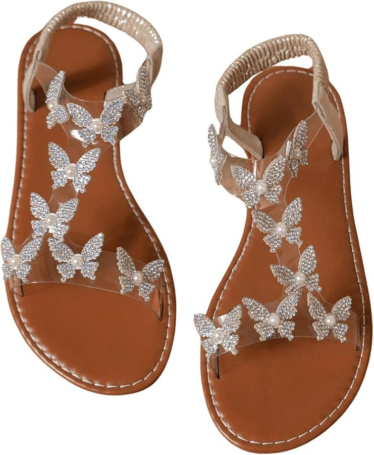 Floerns Women's Elegant Rhinestone Butterfly Transparent Elastic Strap Summer Flat Sandals | Amazon (US)
