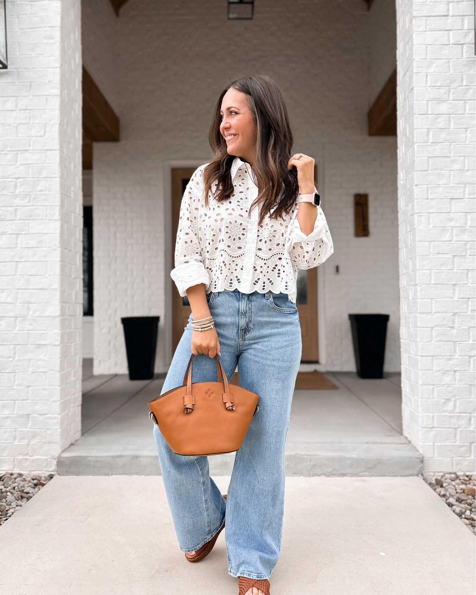 This bag is amazing! The perfect size for all your essentials with a little room to spare! The leather is incredible also! 

My top is tts. I am wearing a large because that is all my store had but I could have done my true size medium. 
Jeans are tts also and the perfect length for me at 5’4”. 
Shoes are also tts  

#LTKfindsunder50 #LTKfindsunder100 #LTKitbag