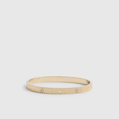 Gold Stainless Steel Heart Bracelet | River Island UK & IE