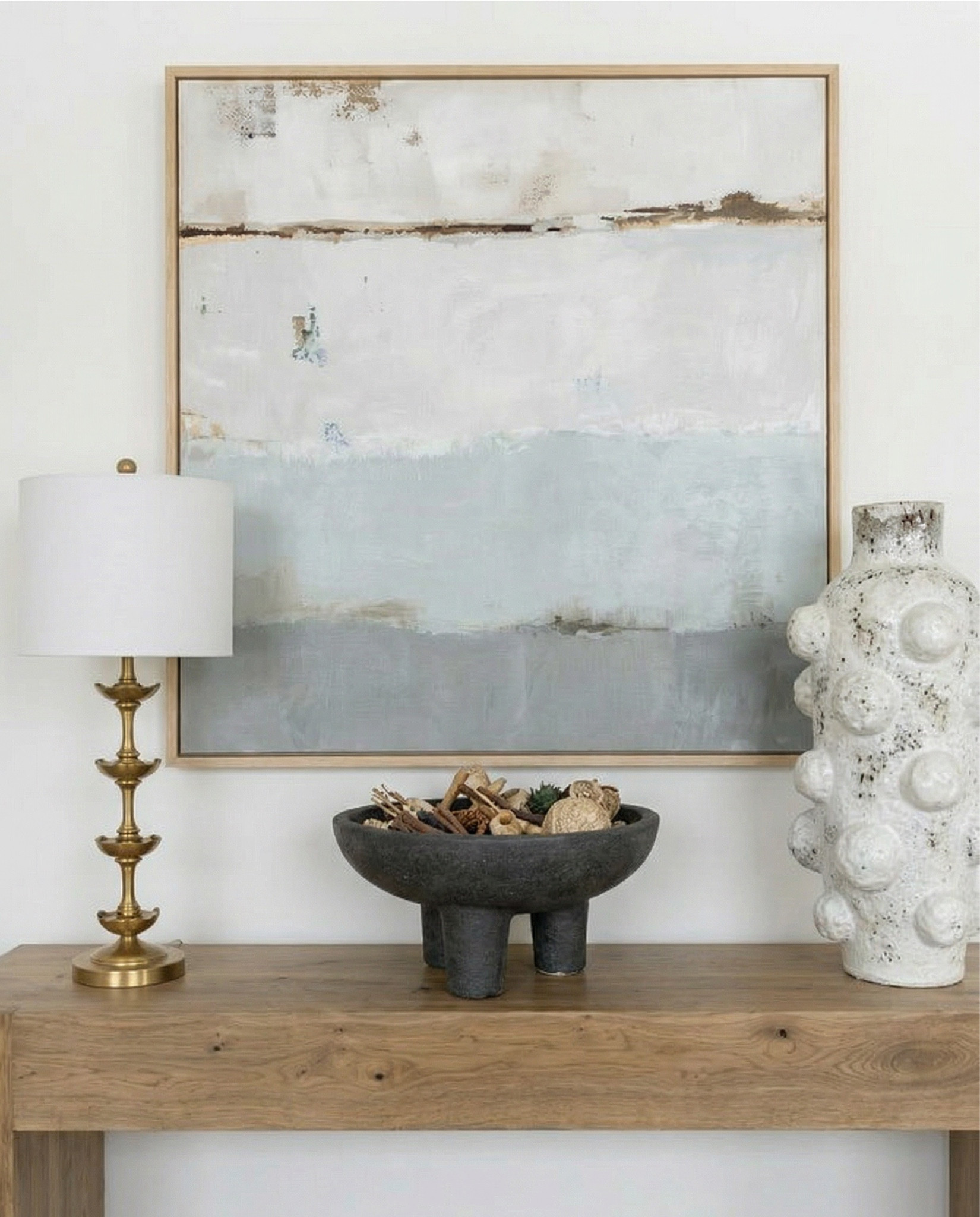 Wood Dining Table
Black upholstered dining  Chairs 
Wood console table
Brass table lamp 
White ceramic vase
Brass candle holders
Blue wall art
Neutral modern wall art
Brass wall sconce 
Wood cabinets 
Blue traditional pattern rug
Blue wall paper
Tall ceramic vase
Black decor bowl 

#LTKSaleAlert #LTKHome