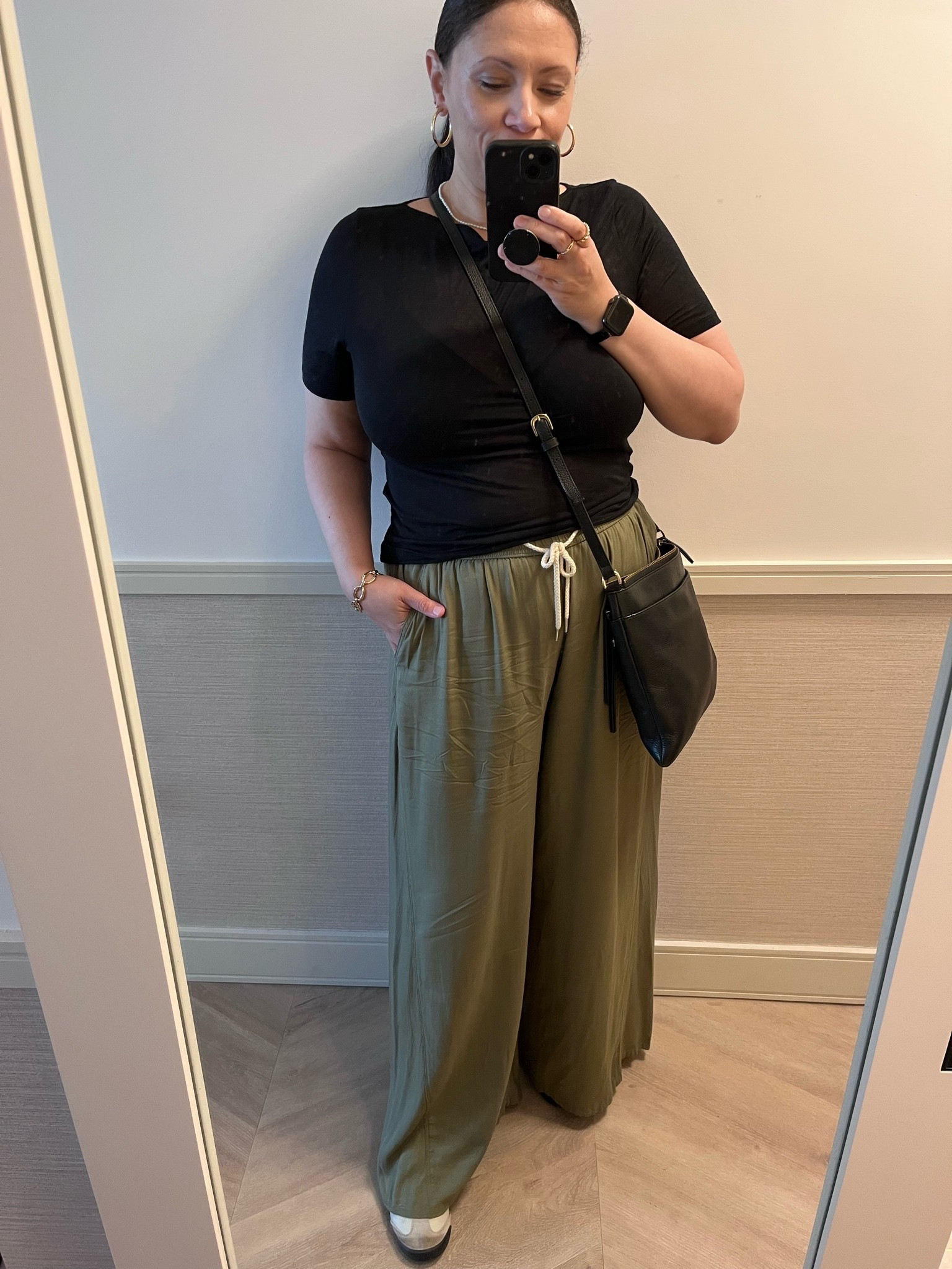 Casual outfit for walking 10,000+ steps in Manhattan.

Sheer tee, wide leg pants, Onitsuka tiger mexico 66, always and forever a crossbody girl.

#LTKOver40 #LTKMidsize #LTKTravel