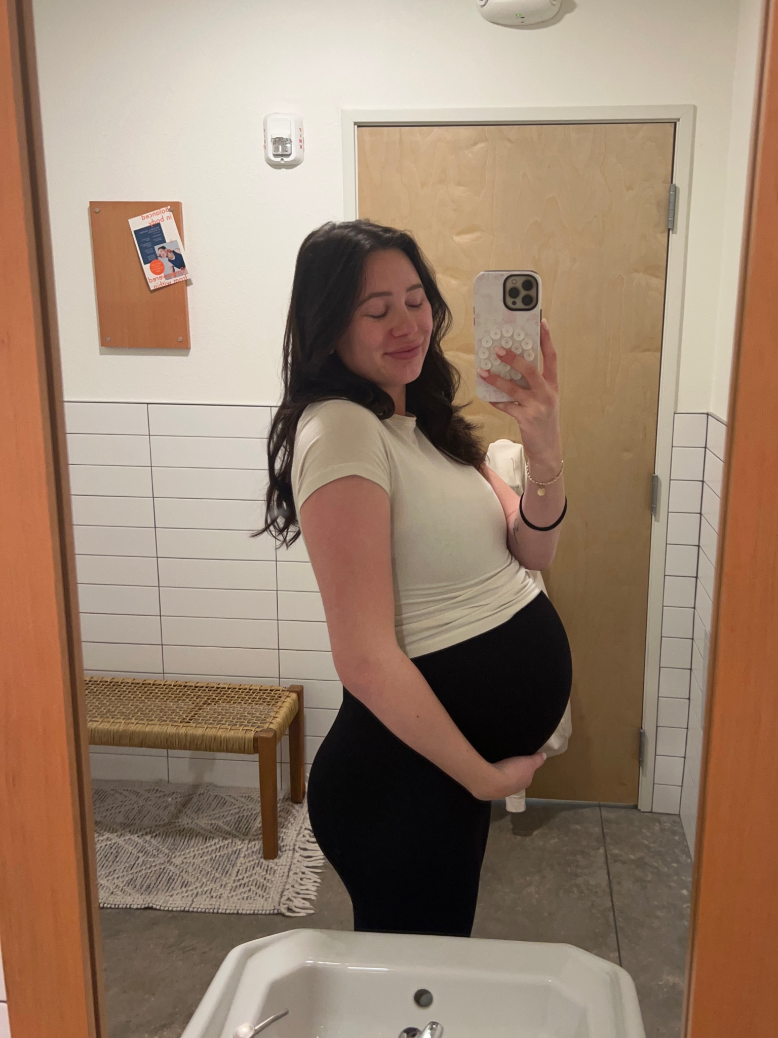 Wearing pre-pregnancy sizes in these (very stretchy) pieces! This jumpsuit (size medium) is so nice so that I don’t have to worry about a waistband while moving so much! The t shirt is for a little extra coverage :) 

#LTKfitness #LTKbump