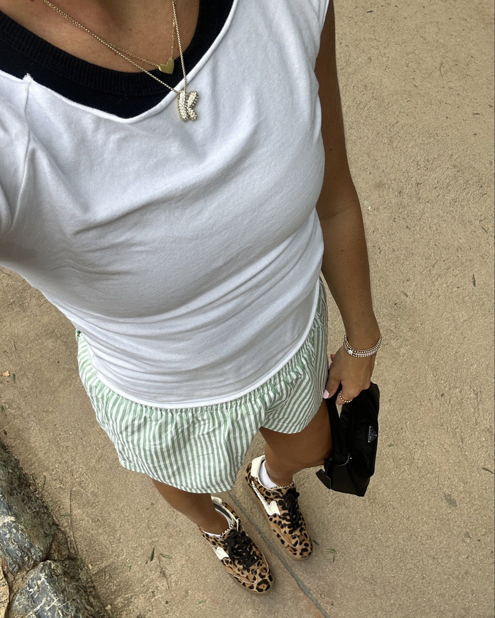 Green boxer shorts and white tshirt with leopard shoes 

#LTKtravel #LTKstyletip #LTKeurope