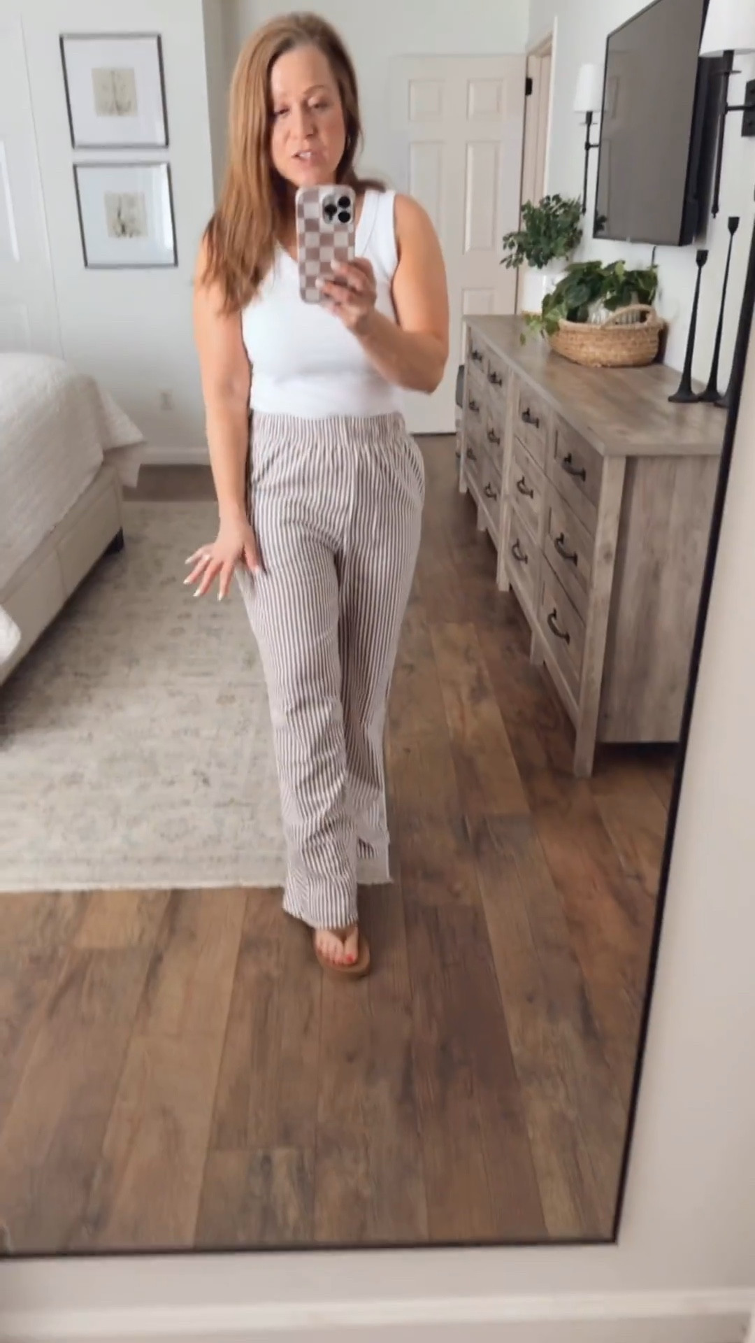 Spring/summer outfit inspo
V neck tank
Ticking stripe wide leg pants 
Sandals 

#LTKmomlife #LTKSeasonal #LTKPetite