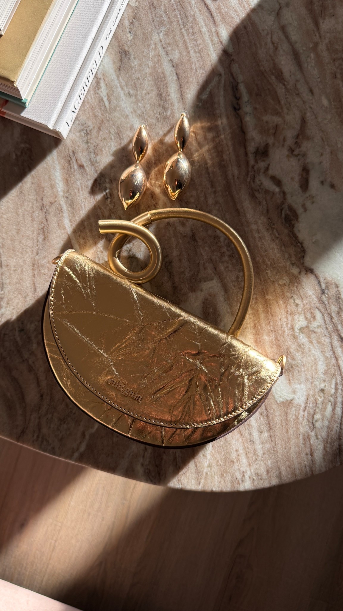 Holiday clutch + earrings pairing! 

#LTKHoliday #LTKGiftGuide