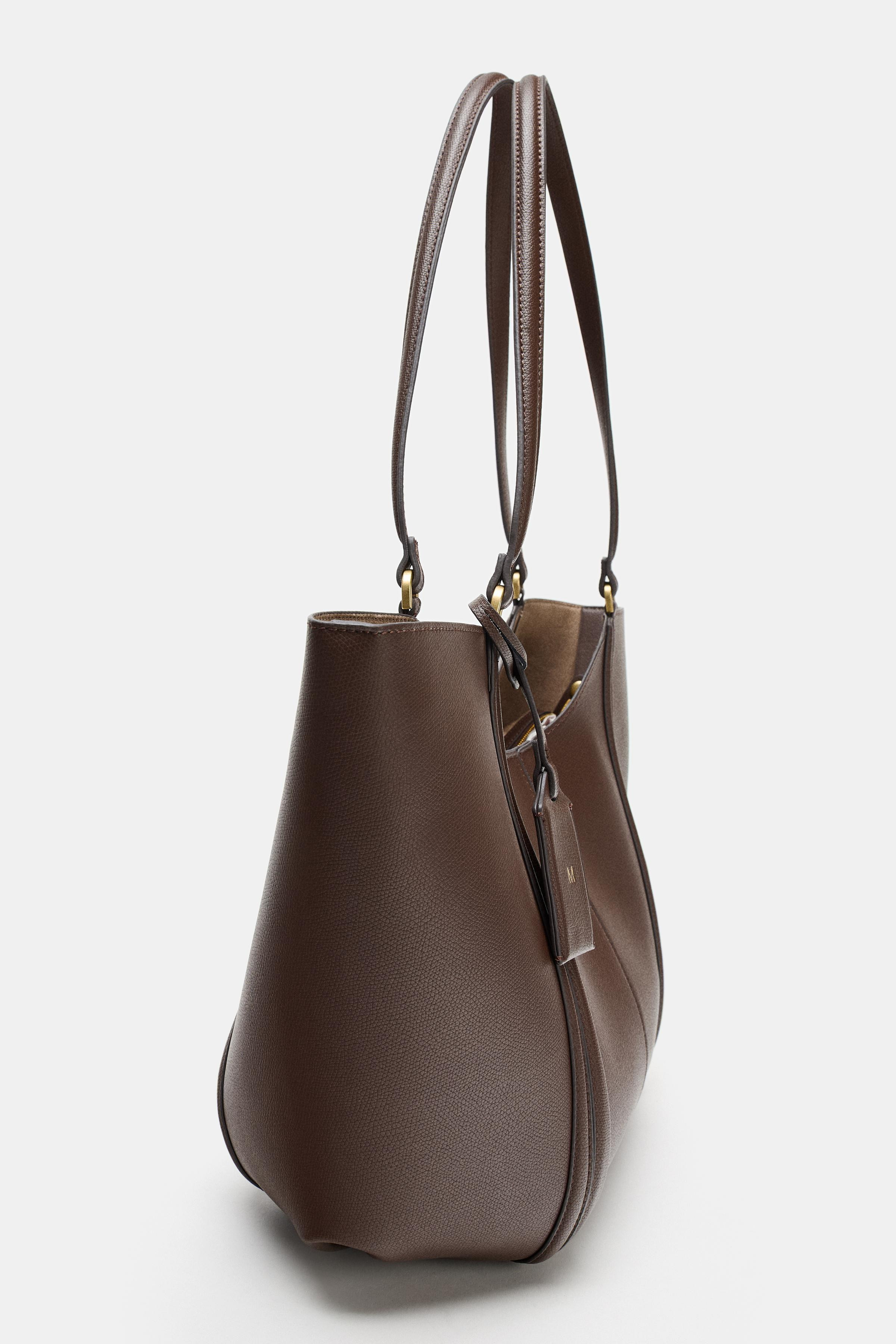 Gr\u00f6\u00dfe des Models: 178 cmMaxi-Shopper mit schulterhenkeln. Ziern\u00e4hte am oberteil. I... | Zara DE